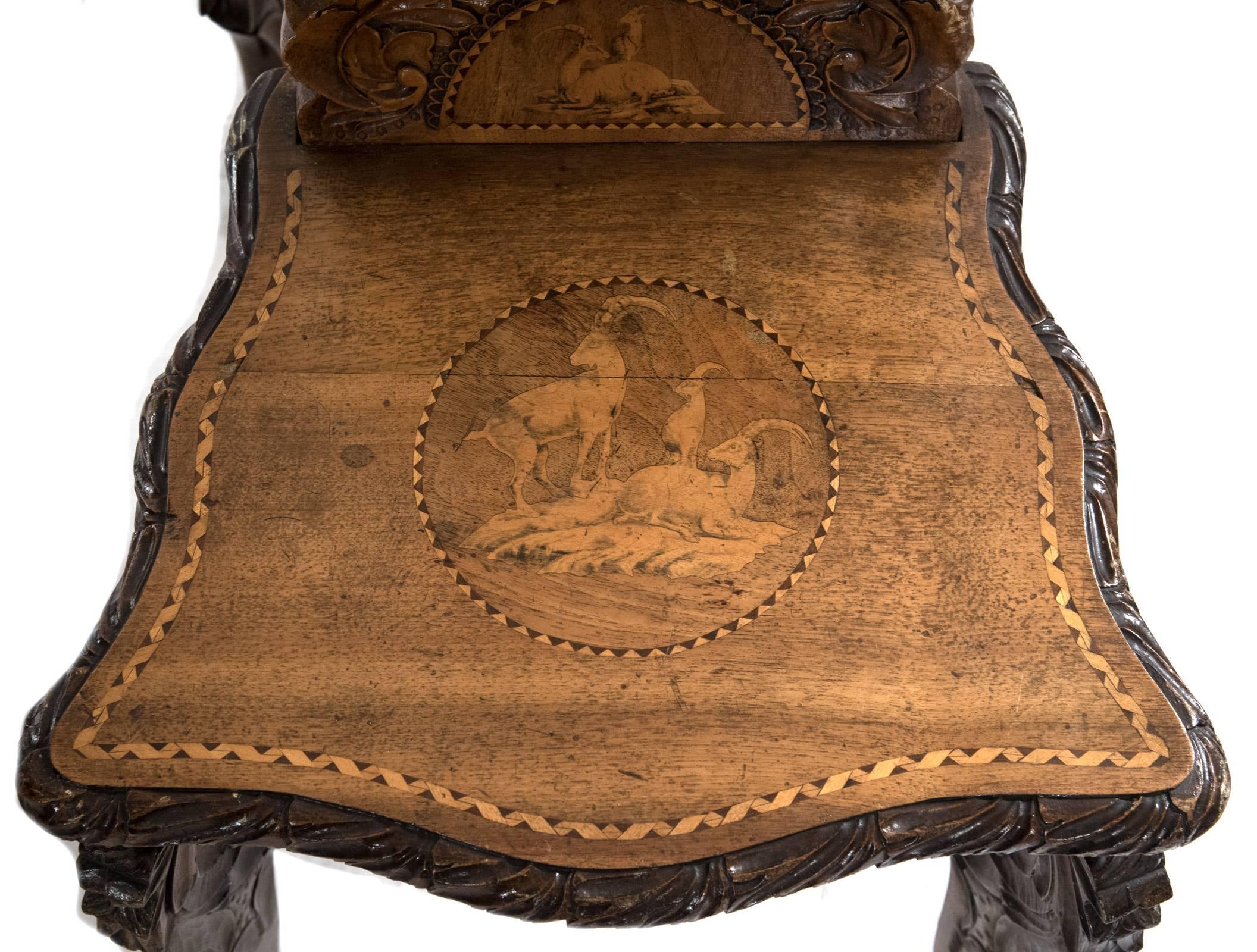 Swiss Black Forest Carved Marquetry Tilt-Top Table and Six Chairs 4