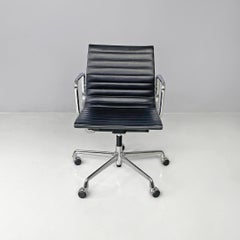 Swiss black leather office chairs EA 117 by Charles & Ray Eames for Vitra, 2000s