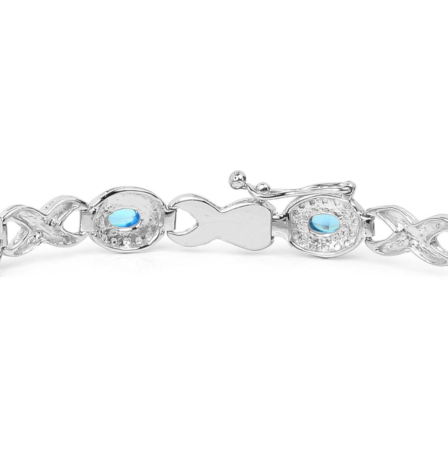 Pulsera cruzada con cabujón de topacio azul suizo 5,5 quilates Plata en Excelente estado para la venta en Punta Gorda, FL