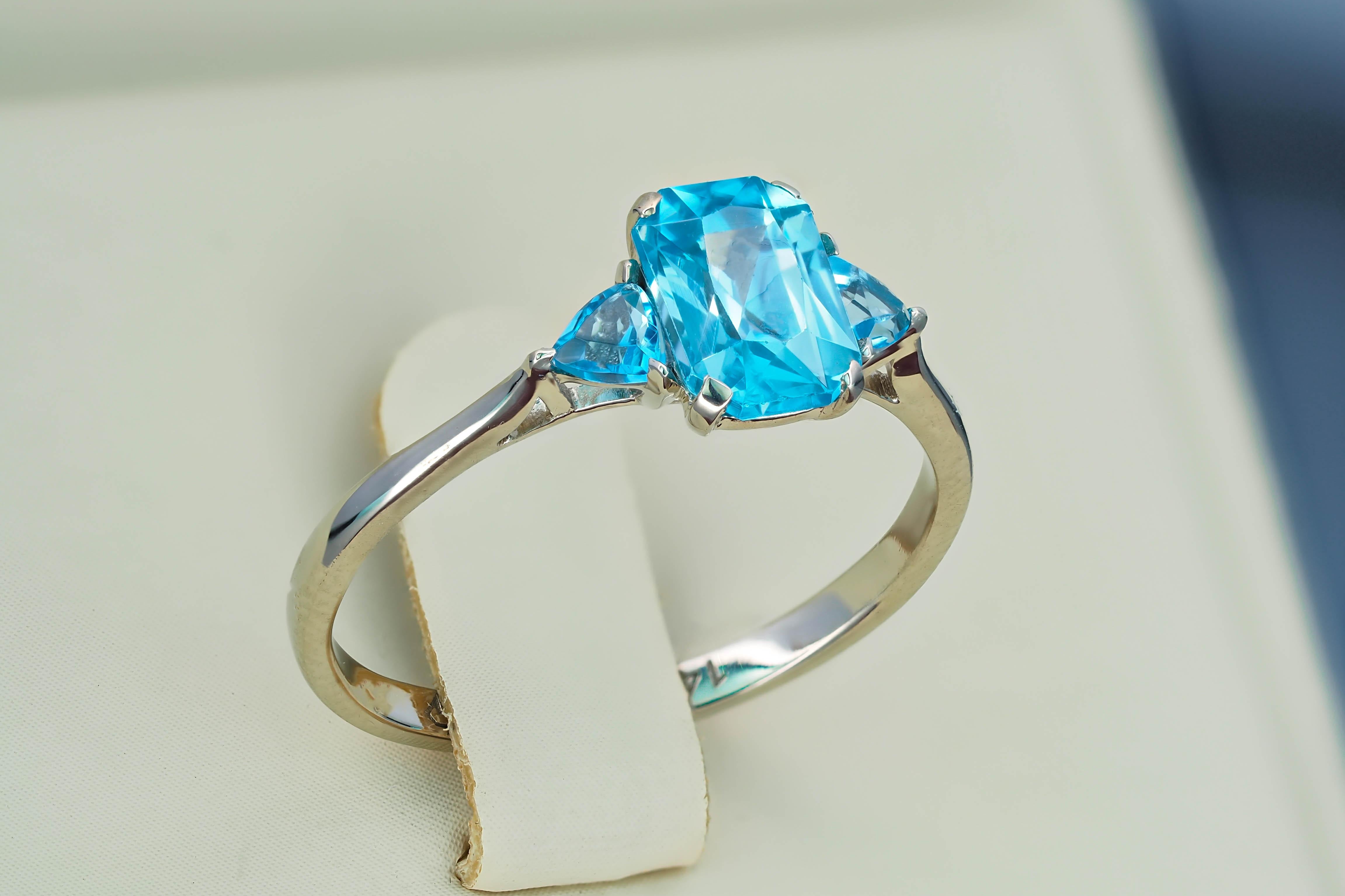 Modern Swiss Blue Topaz 14k Gold Ring.  For Sale
