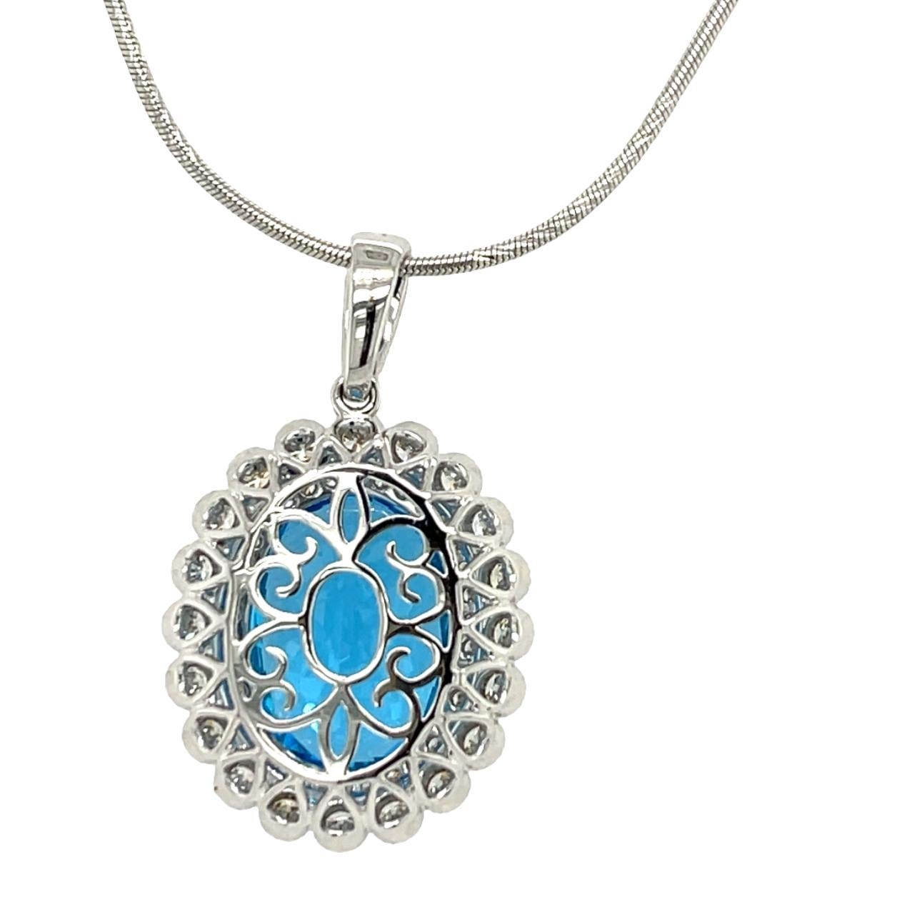 Oval Cut Swiss Blue Topaz and Diamond Pendant in 14K White Gold For Sale