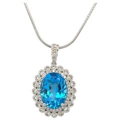 Pendentif en or blanc 14K avec topaze bleue suisse et diamant