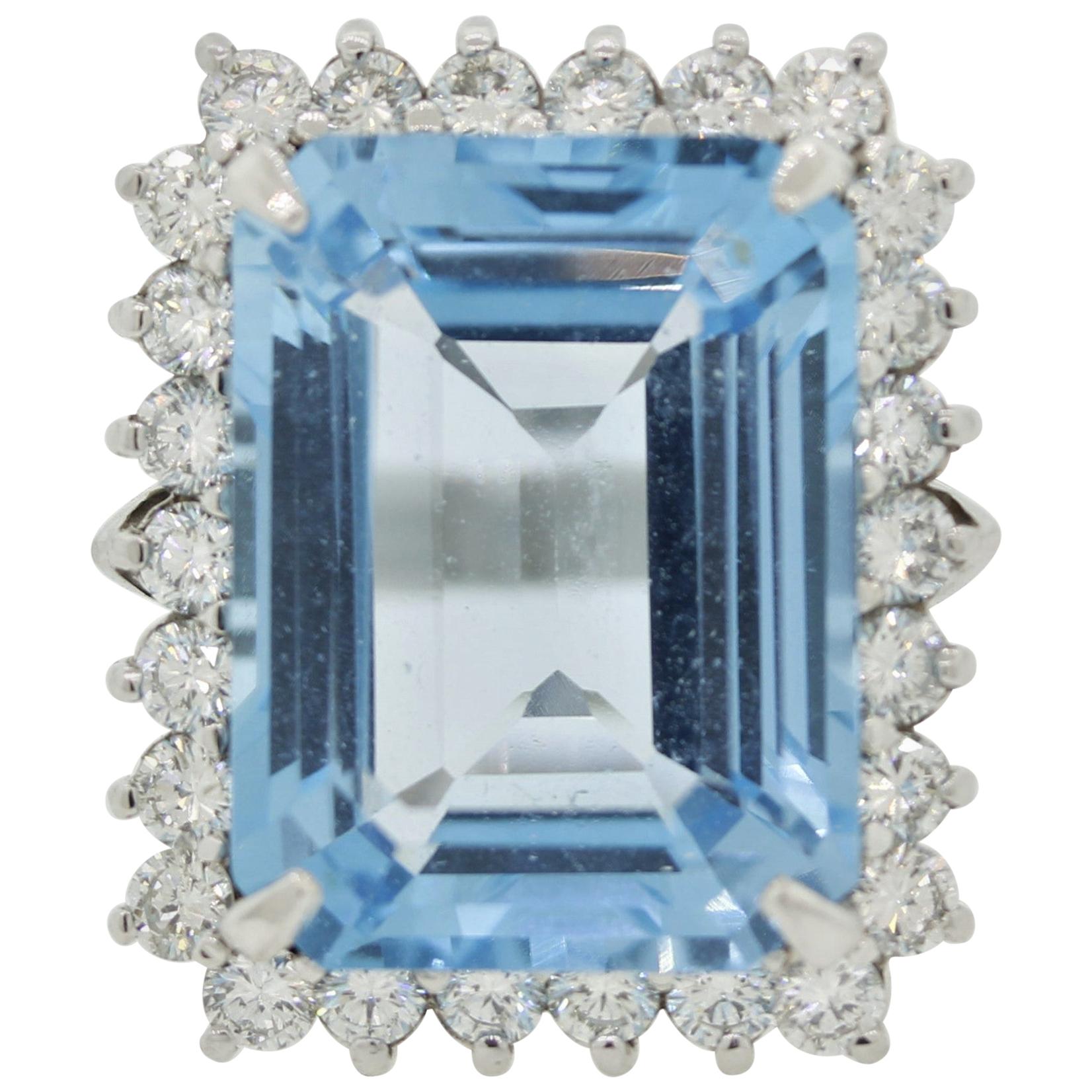 Swiss Blue Topaz Diamond Halo Platinum Cocktail Ring For Sale