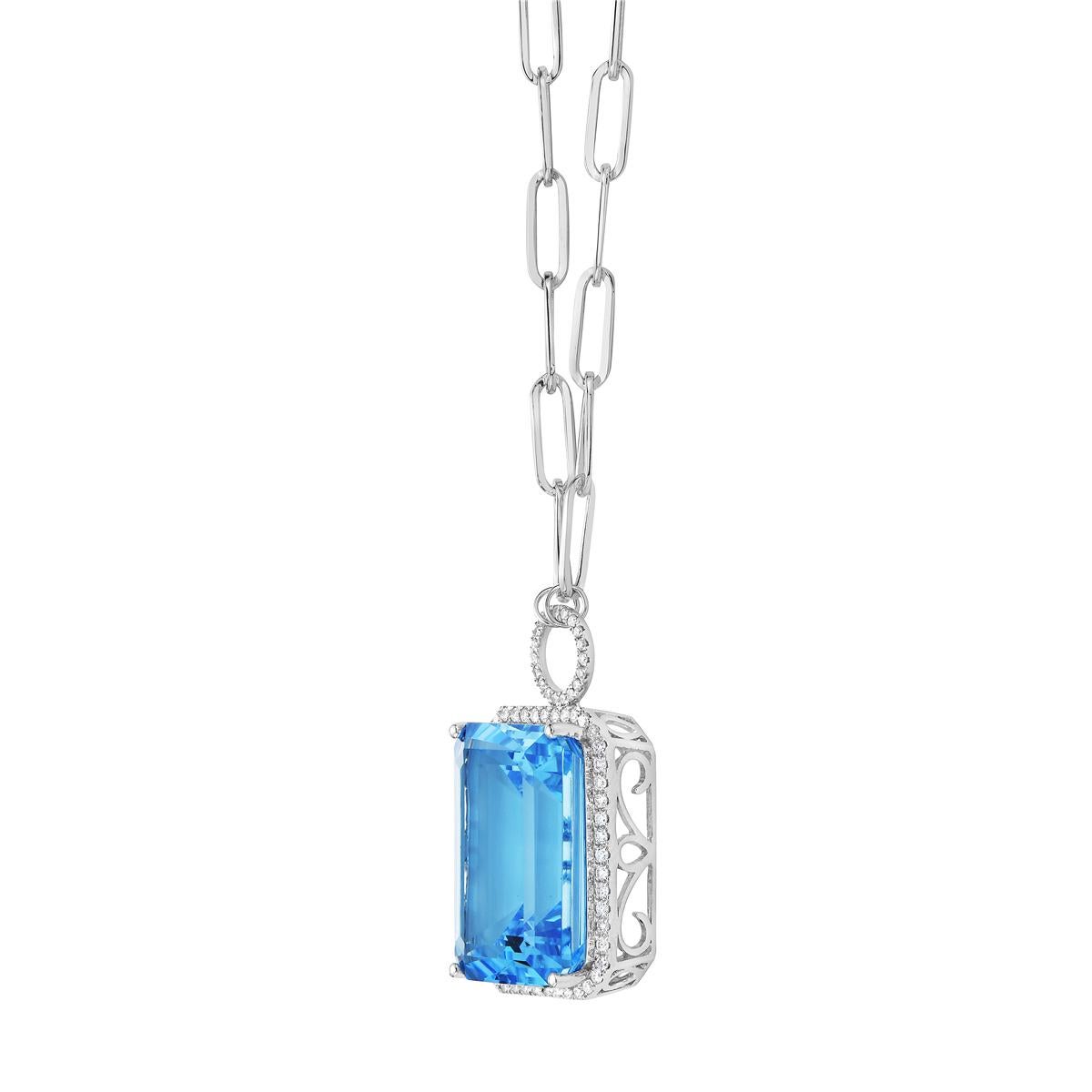 With this exquisite semi-precious Swiss blue topaz diamond necklace, style and glamour are in the spotlight. This 14-karat cushion cut necklace is made from 3.3 grams of gold, 1 sky blue topaz totaling 29.57 karats, and is surrounded by 69 round