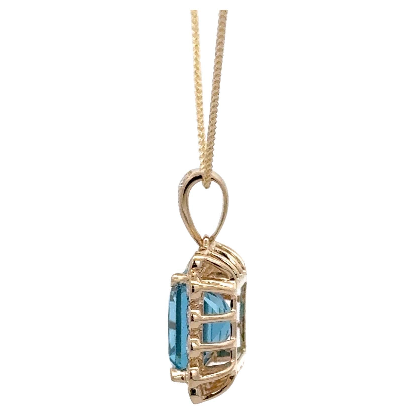 Contemporary Swiss Blue Topaz Diamond Pendant 6.10 Carats 14 Karat Yellow Gold For Sale