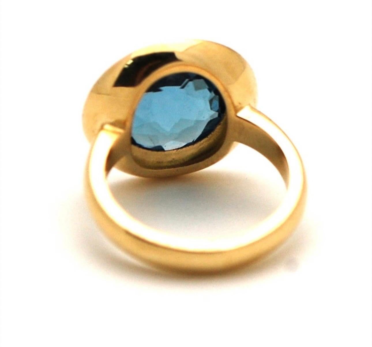 Bague suisse en or 18 carats avec topaze bleue et diamant taille 8 Unisexe en vente