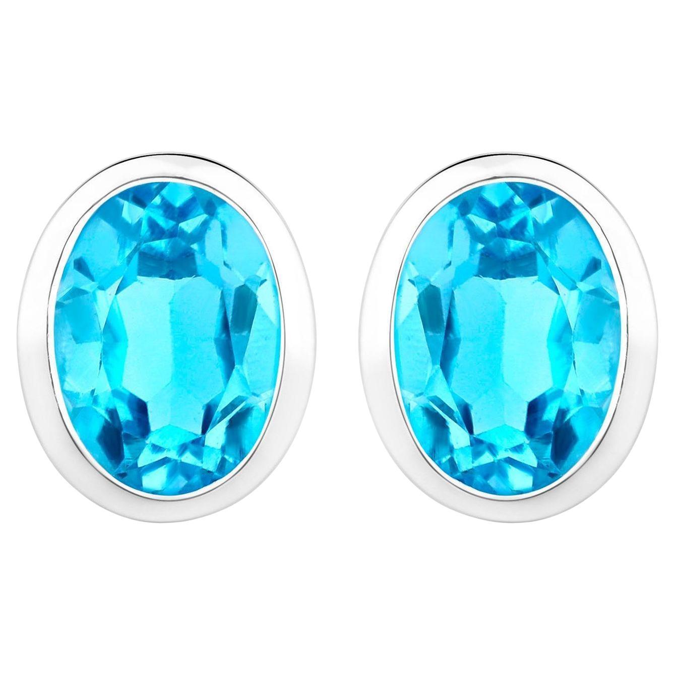 Boucles d
oreilles Topaze Bleue Suisse 4 Carats Bezel Set Sterling Silver