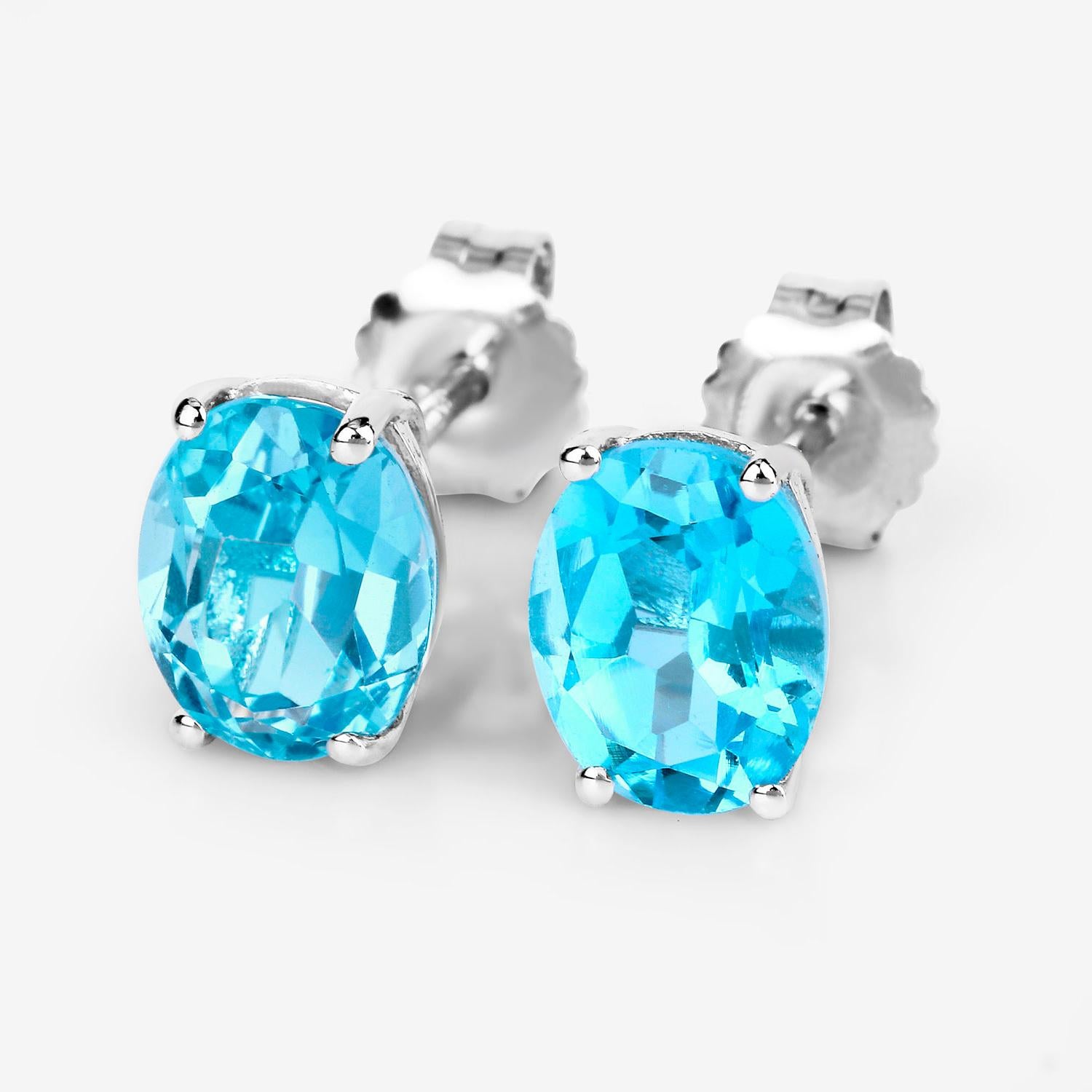 Contemporary Swiss Blue Topaz Earrings 4 Carats Prong Set Sterling Silver For Sale