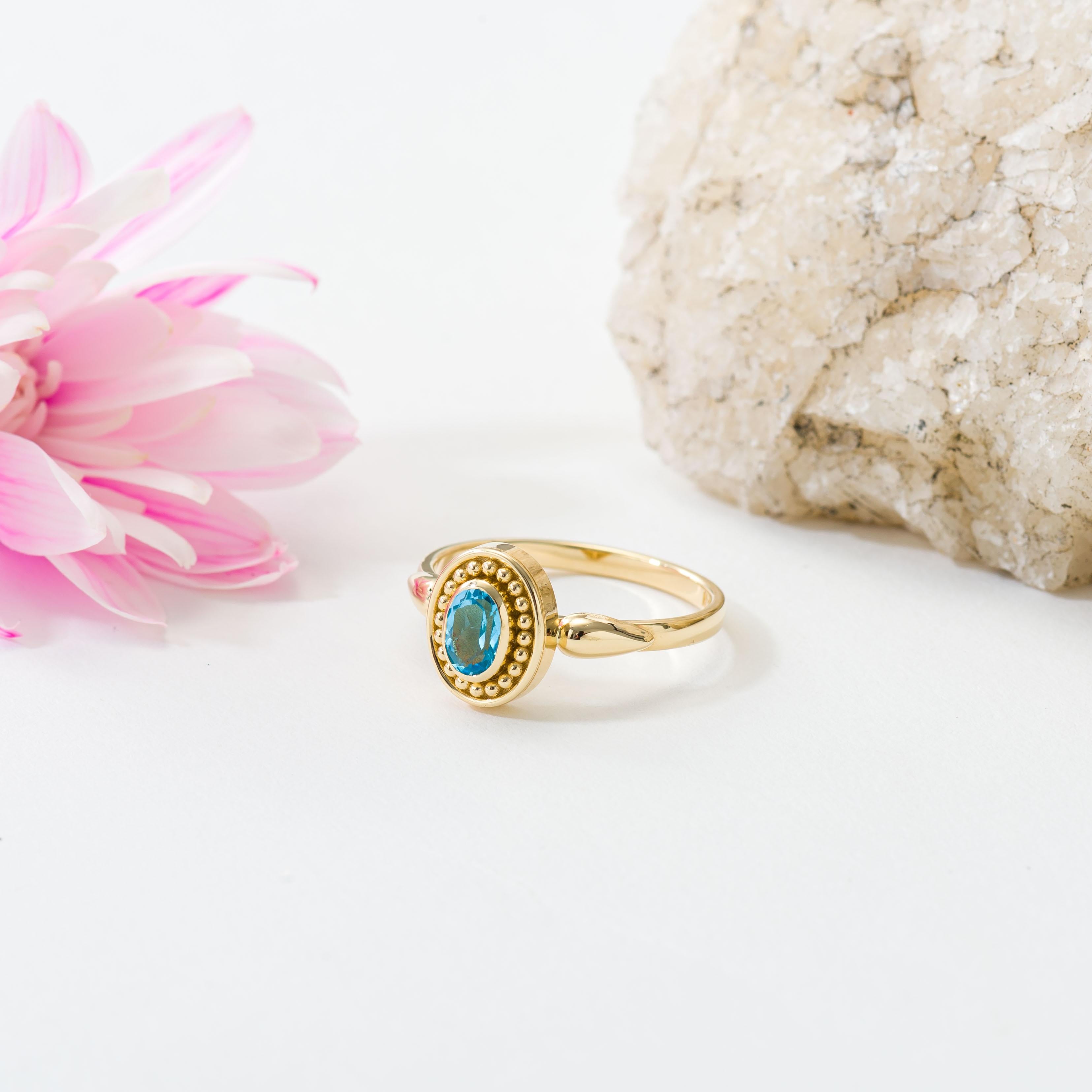 Oval Cut Swiss Blue Topaz Gold Byzantine Ring For Sale