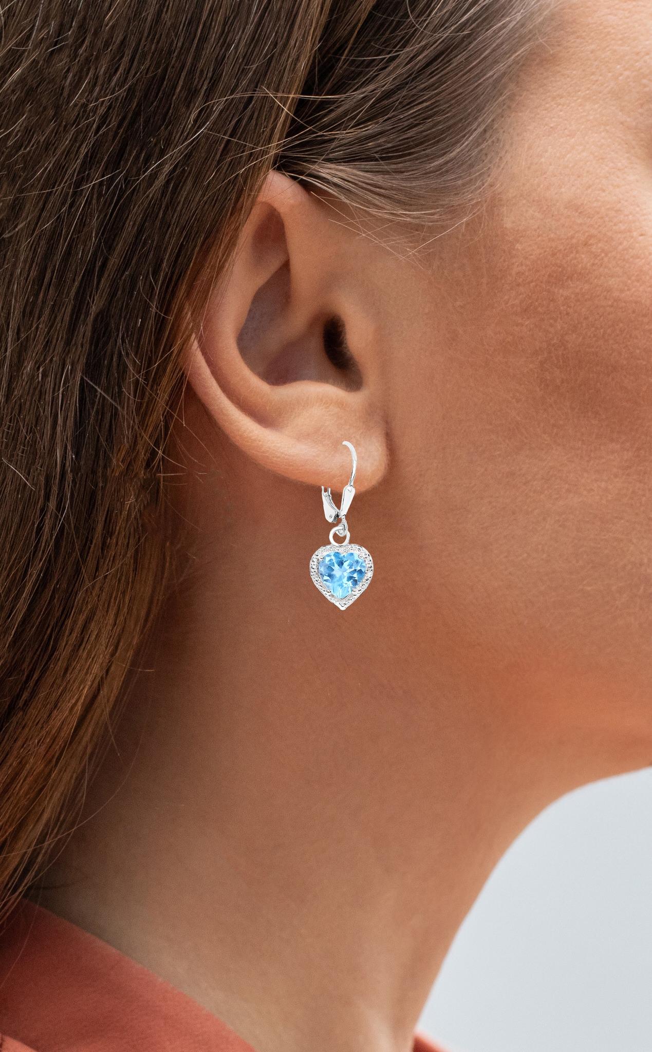 It comes with the Gemological Appraisal by GIA GG/AJP
All Gemstones are Natural in Origin
2 Swiss Blue Topazes  = 4.20 Carats
Metal: Rhodium Plated Sterling Silver
Lever Back
Dimensions: 29 x 12 mm