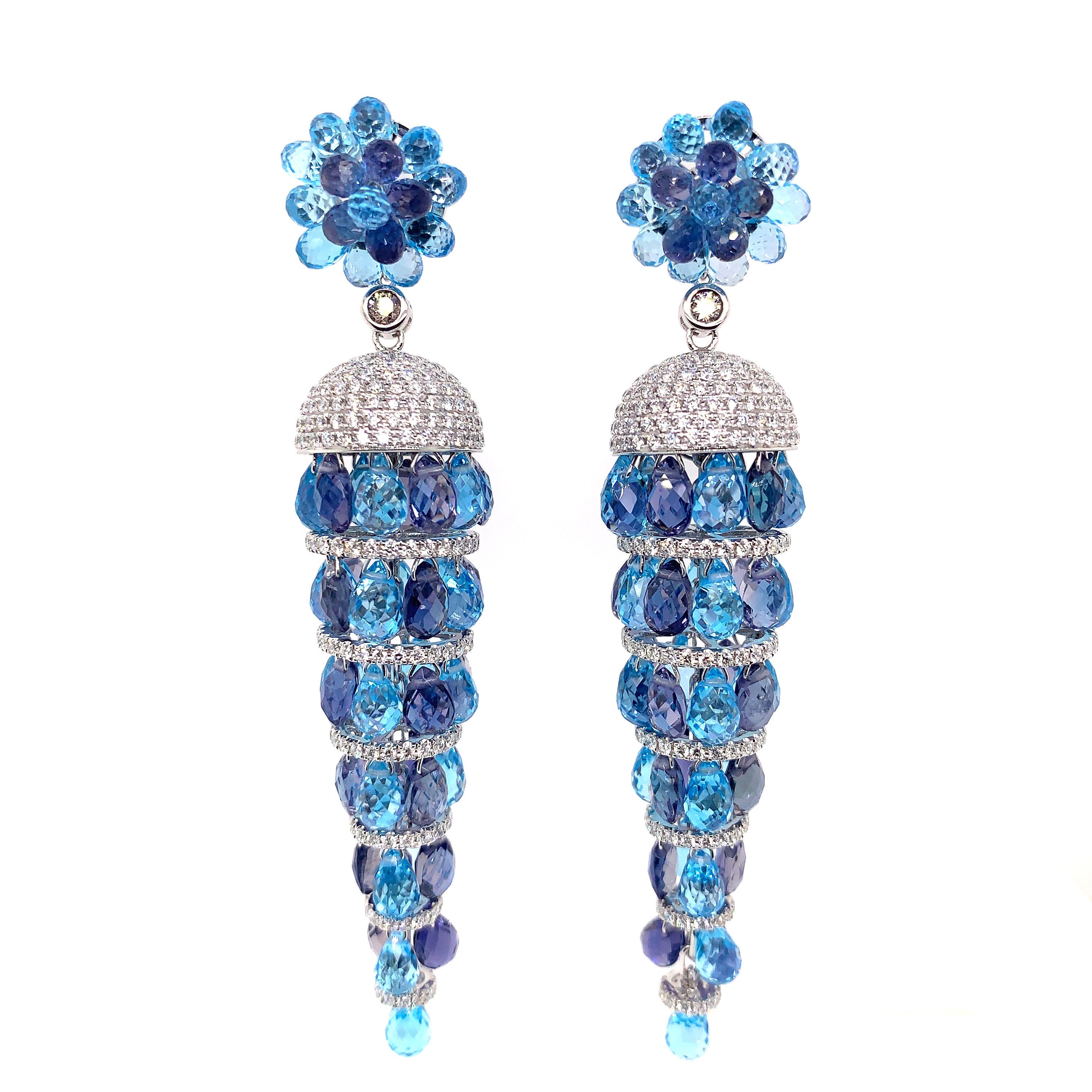 Glamorous Gemstones - Sunita Nahata started off her career as a gemstone trader, and this particular collection reflects her love for multi-coloured semi-precious gemstones. Here Sunita presents a unique pairing of swiss blue topaz with iolite to