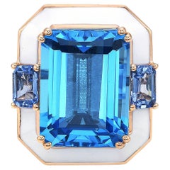 Diamantring aus Roségold mit blauem Schweizer Blautopas