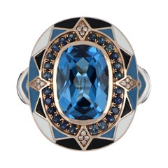 Bague suisse en or rose 14 carats, topaze bleue, saphir et émail clouté