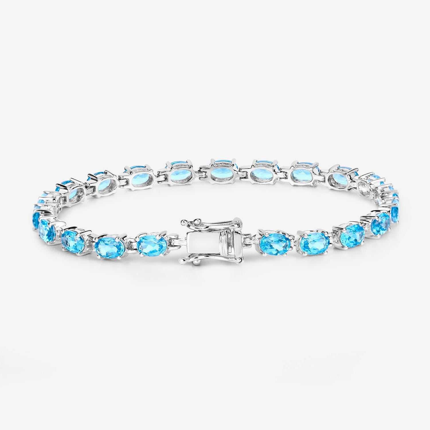Bracelet tennis suisse de 10,7 carats en argent sterling et topaze bleue Excellent état - En vente à Aliso Viejo, CA