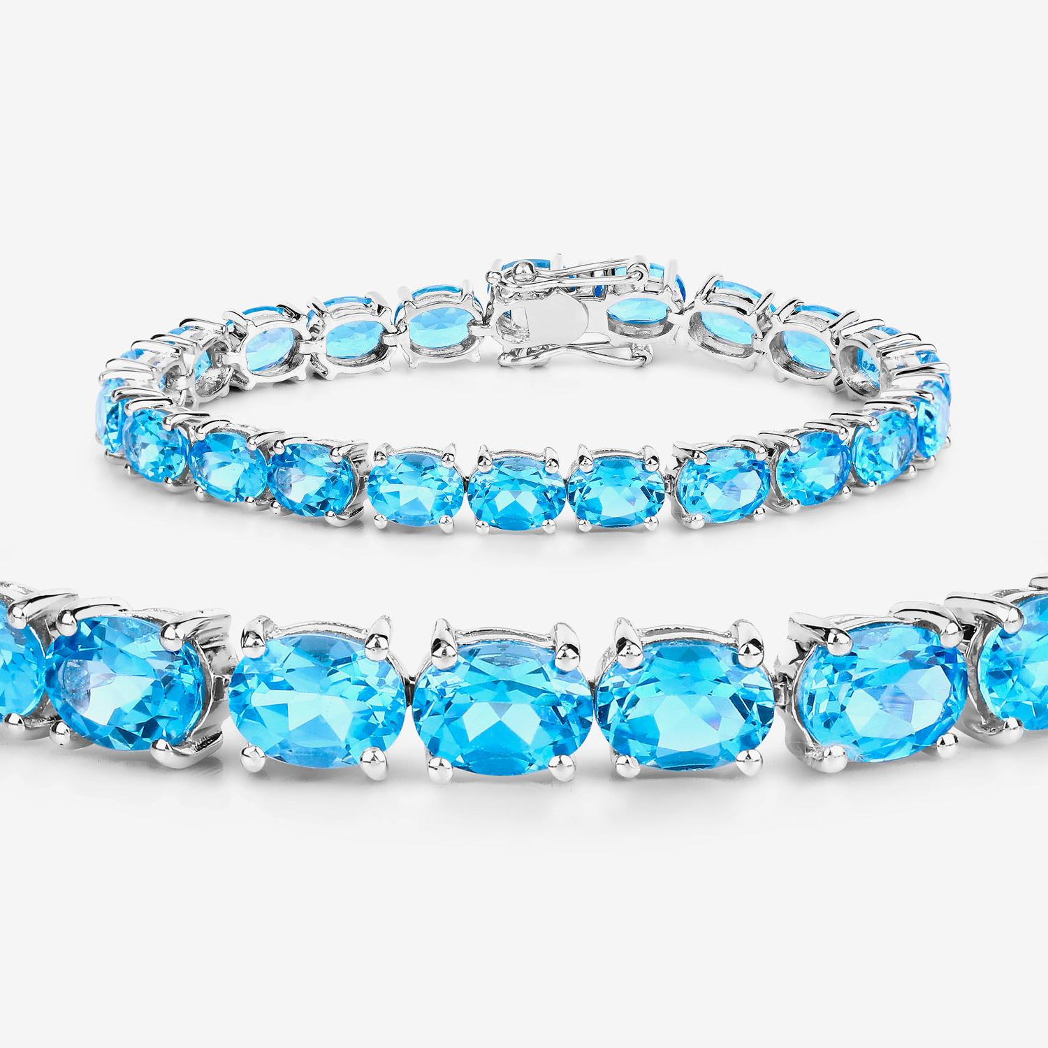 Contemporary Swiss Blue Topaz Tennis Bracelet 35 Carats Rhodium Plated Sterling Silver For Sale