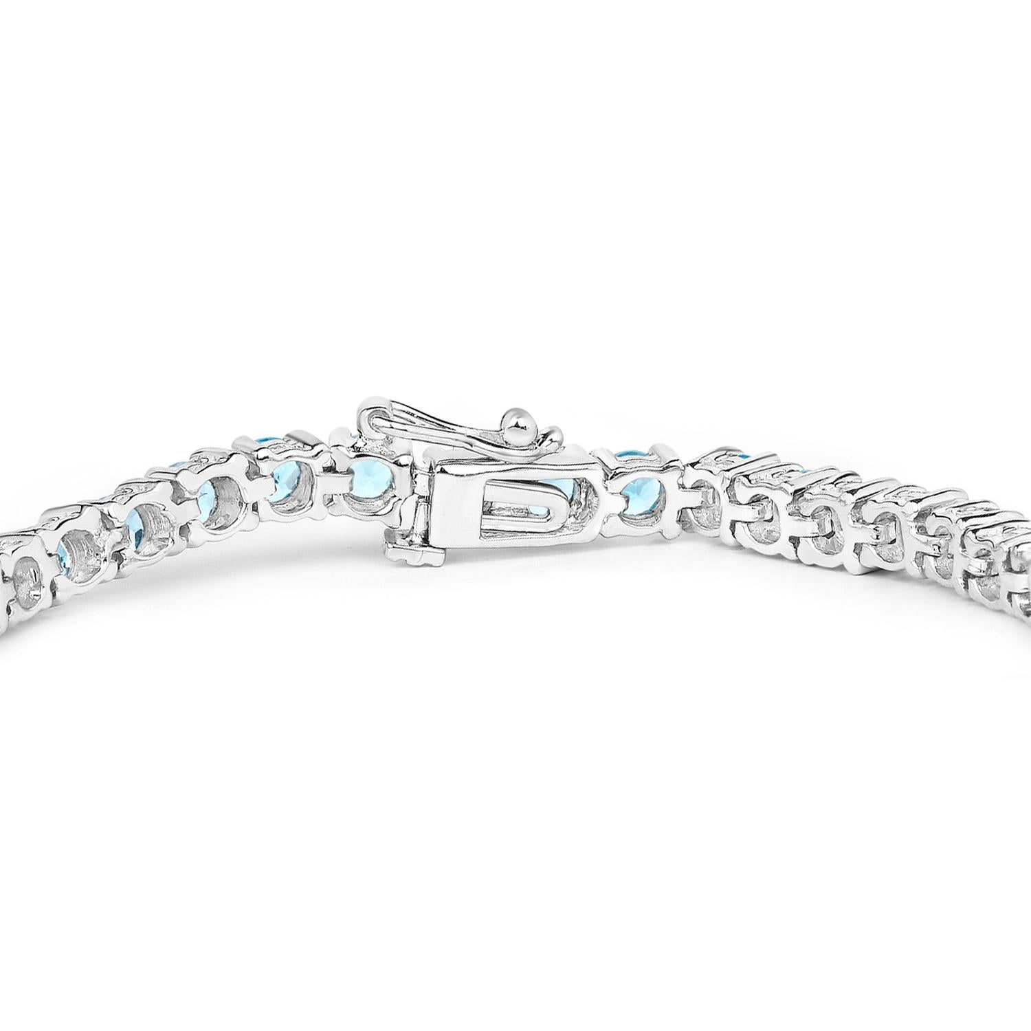 Taille ronde Bracelet tennis suisse de 8.38 carats en argent sterling et topaze bleue en vente