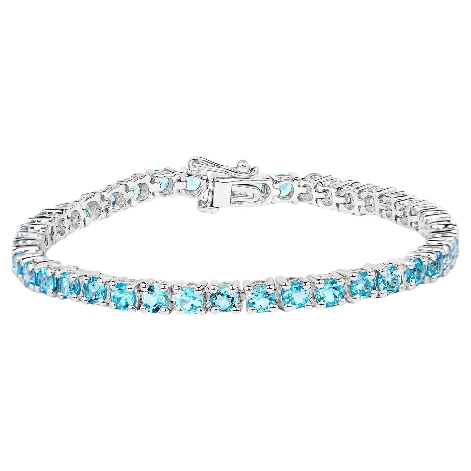 Bracelet tennis suisse de 8.38 carats en argent sterling et topaze bleue en vente