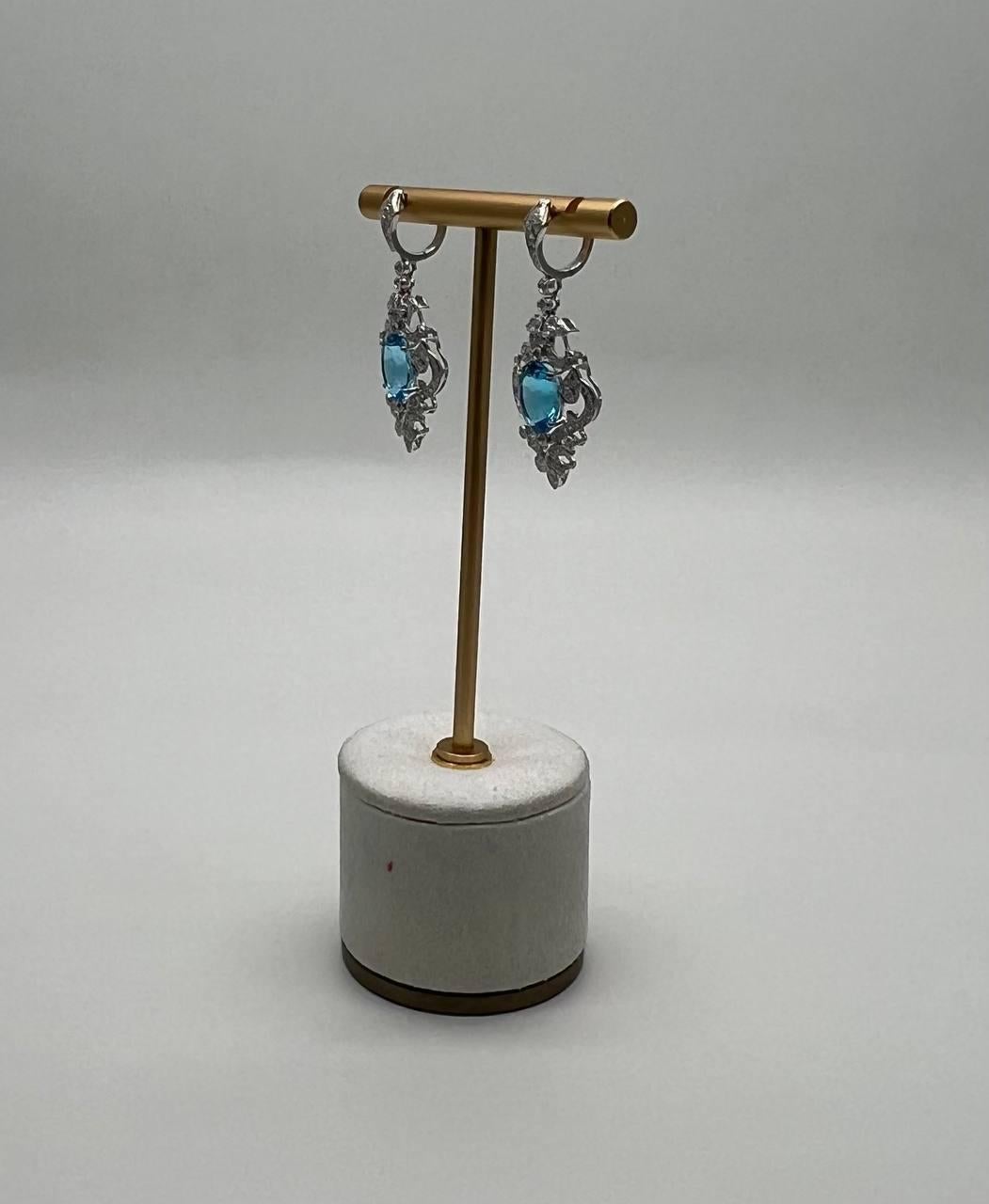 Modern Swiss Blue Topaz White Diamonds 14K White Gold Statement Scroll Earrings For Sale