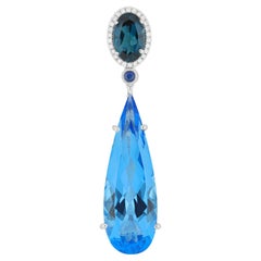 Ciondolo svizzero Bluecrash, Topazio Blu di Londra, Zaffiro Blu e Diamante in oro 18k