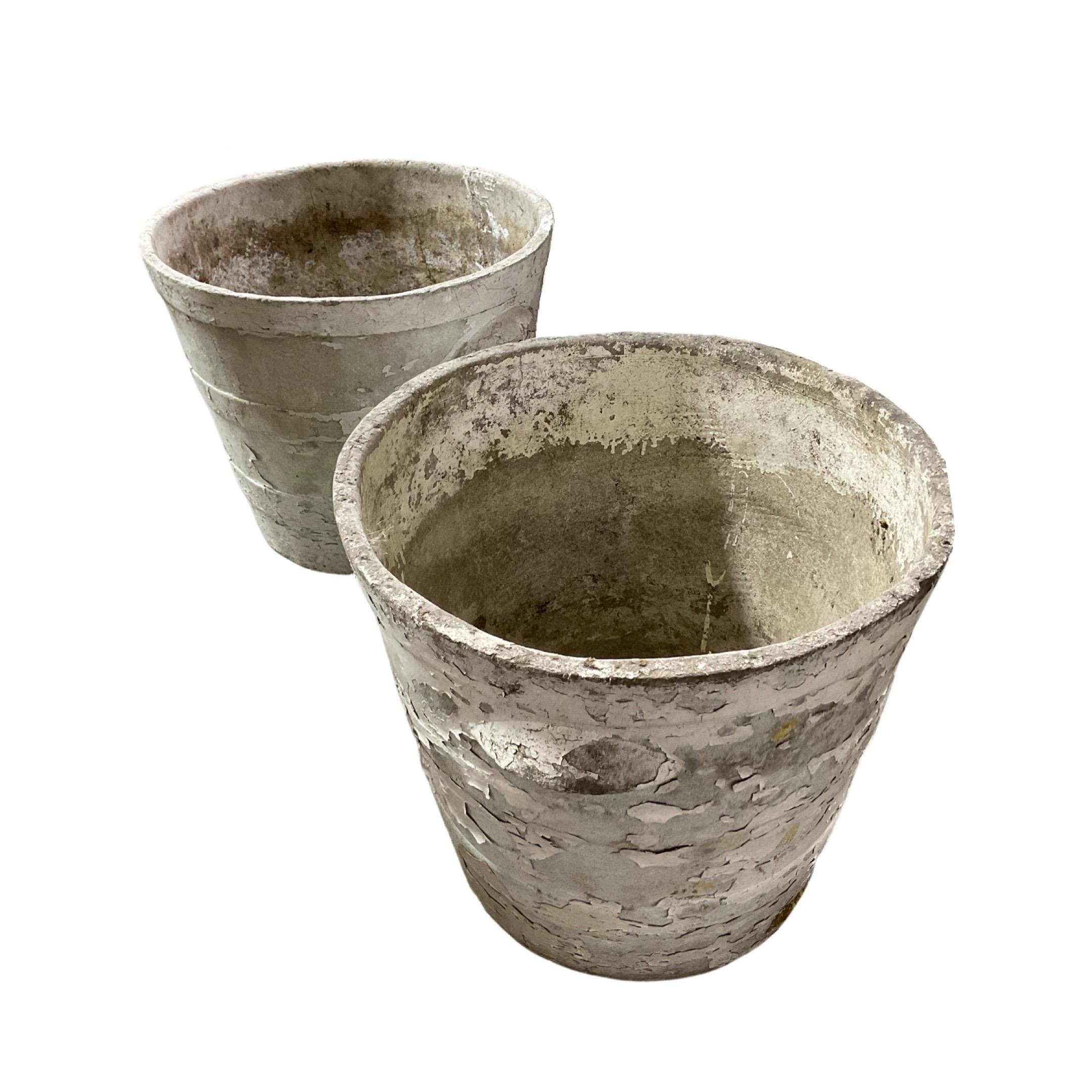 Pair of concrete planters made out of a concrete composite. Originates from Switzerland. Circa, 1950's. Designed by Willy Guhl. Sold as a pair.