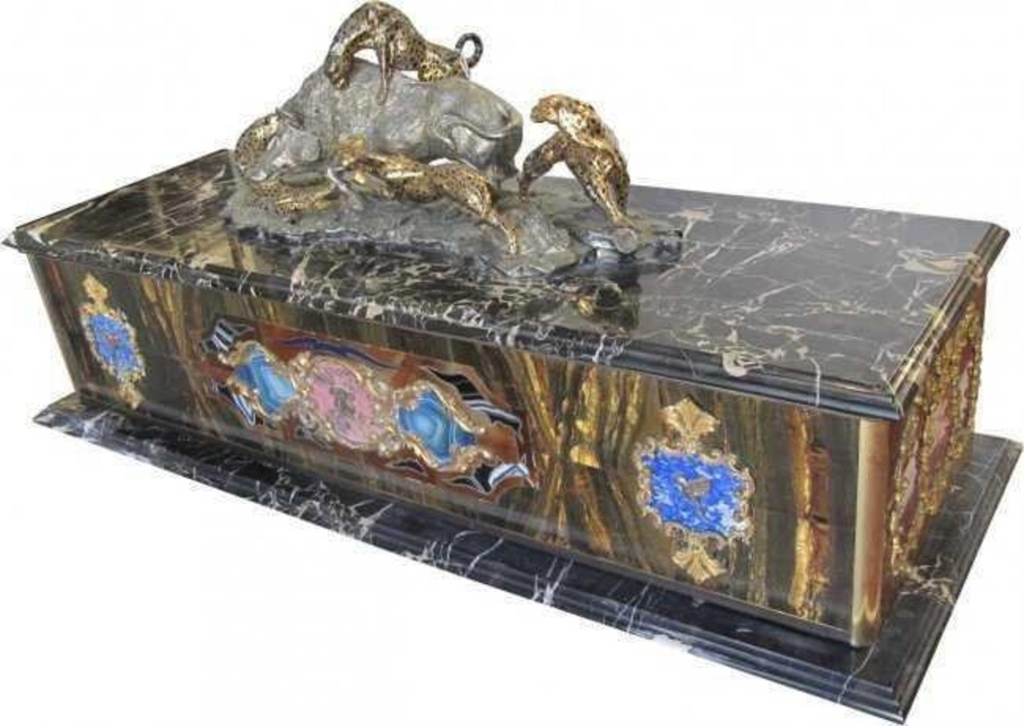 Unusual Swiss cylinder music box, marble and bronze case
probably Swiss, marble and silvered bronze case, the cylinder is interchangeable, but there is only one cylinder with it. The case with inset colored marbles, the top with three cheetah