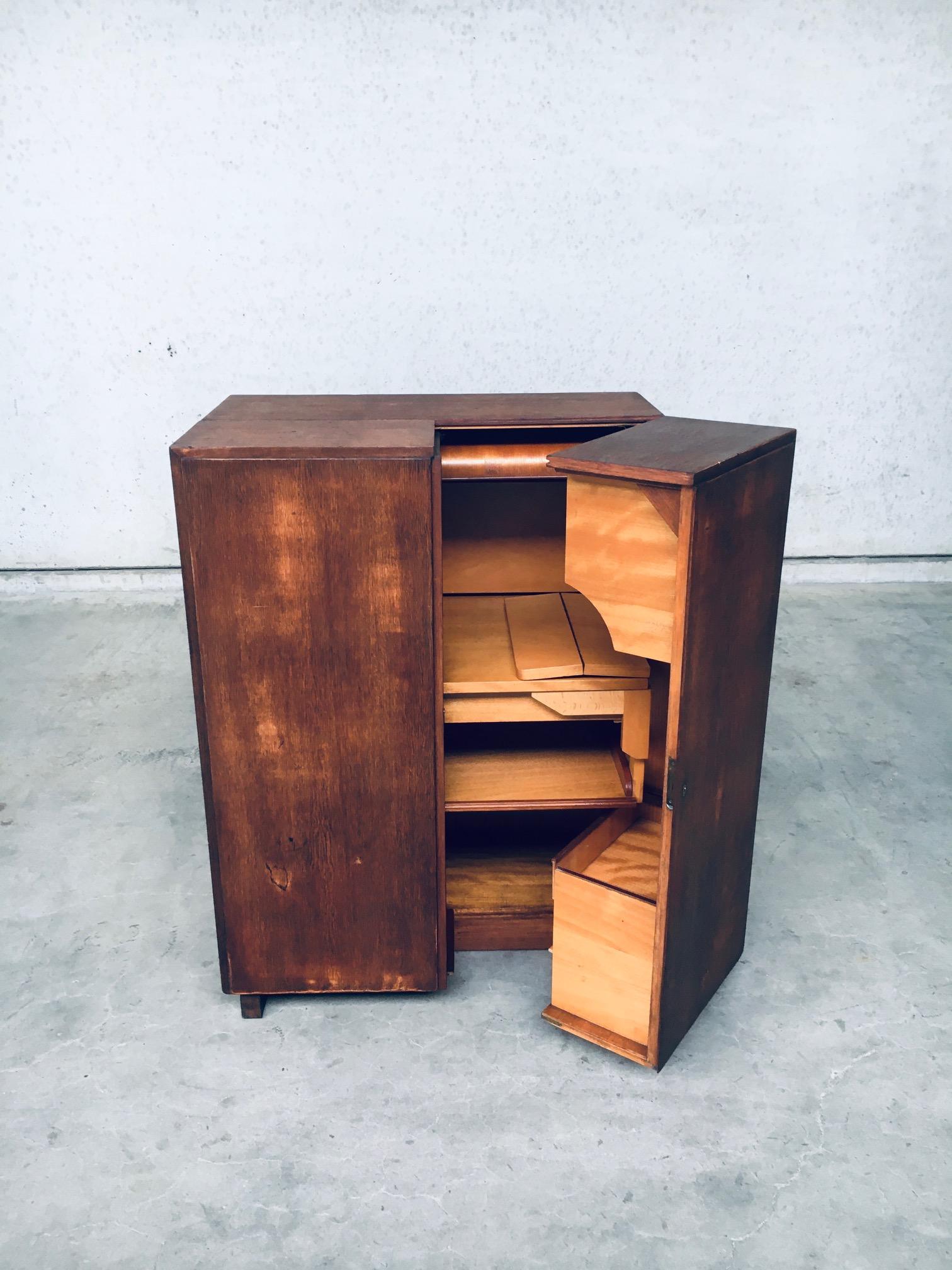 Vintage mid-century Swiss design magic box desk by Mummenthaler & Meier. The 'MAGIC BOX' desk or secretaire was designed by Mummenthaler and Meier in Switzerland in the 1950's / 60's. The piece closes completely and can be key-locked (key not