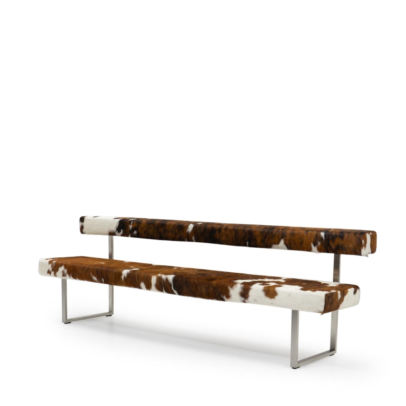 Permesso, conceived by designers Kurt Müller and Daniel Leist, offers a contemporary take on the conventional bench. 

Its allure lies in its formal simplicity and lightness, reimagining the traditional arrangement with two floating cubes. The seat