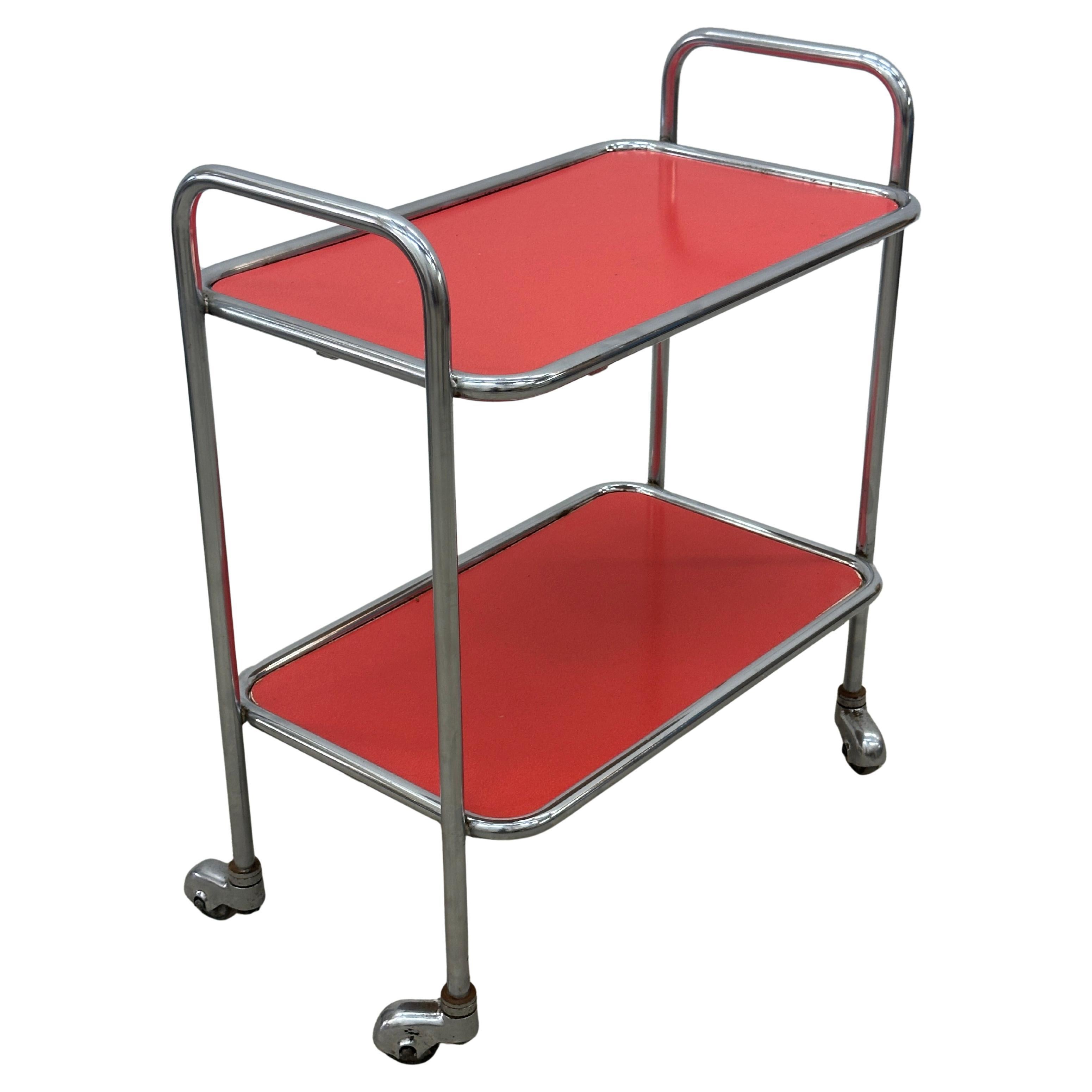 Chariot de bar tubulaire Design/One avec plateaux en formica rouge style 1950 Marcel Breuer en vente