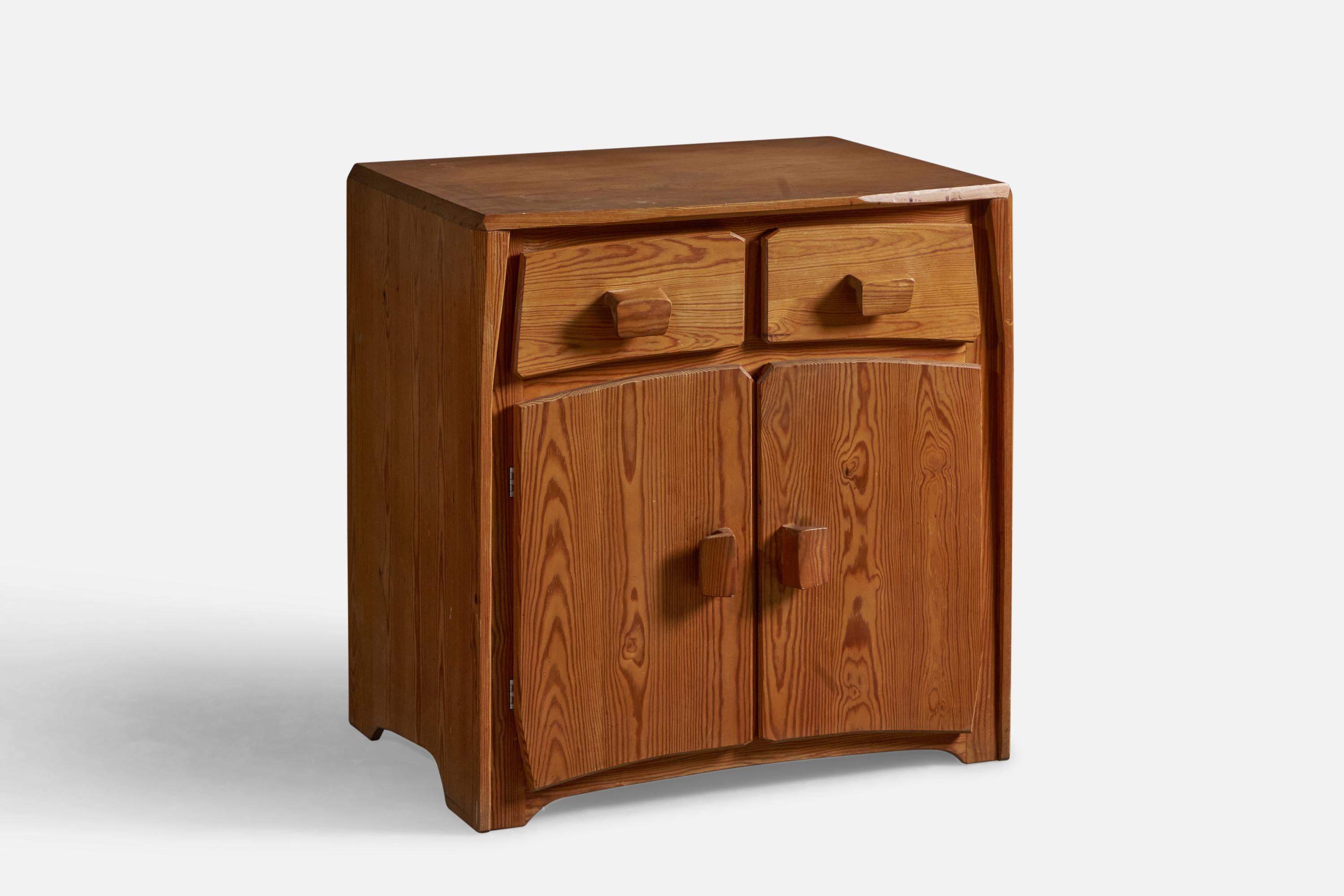 A pine cabinet or chest of drawers, designed and produced in Switzerland, c. 1930s.