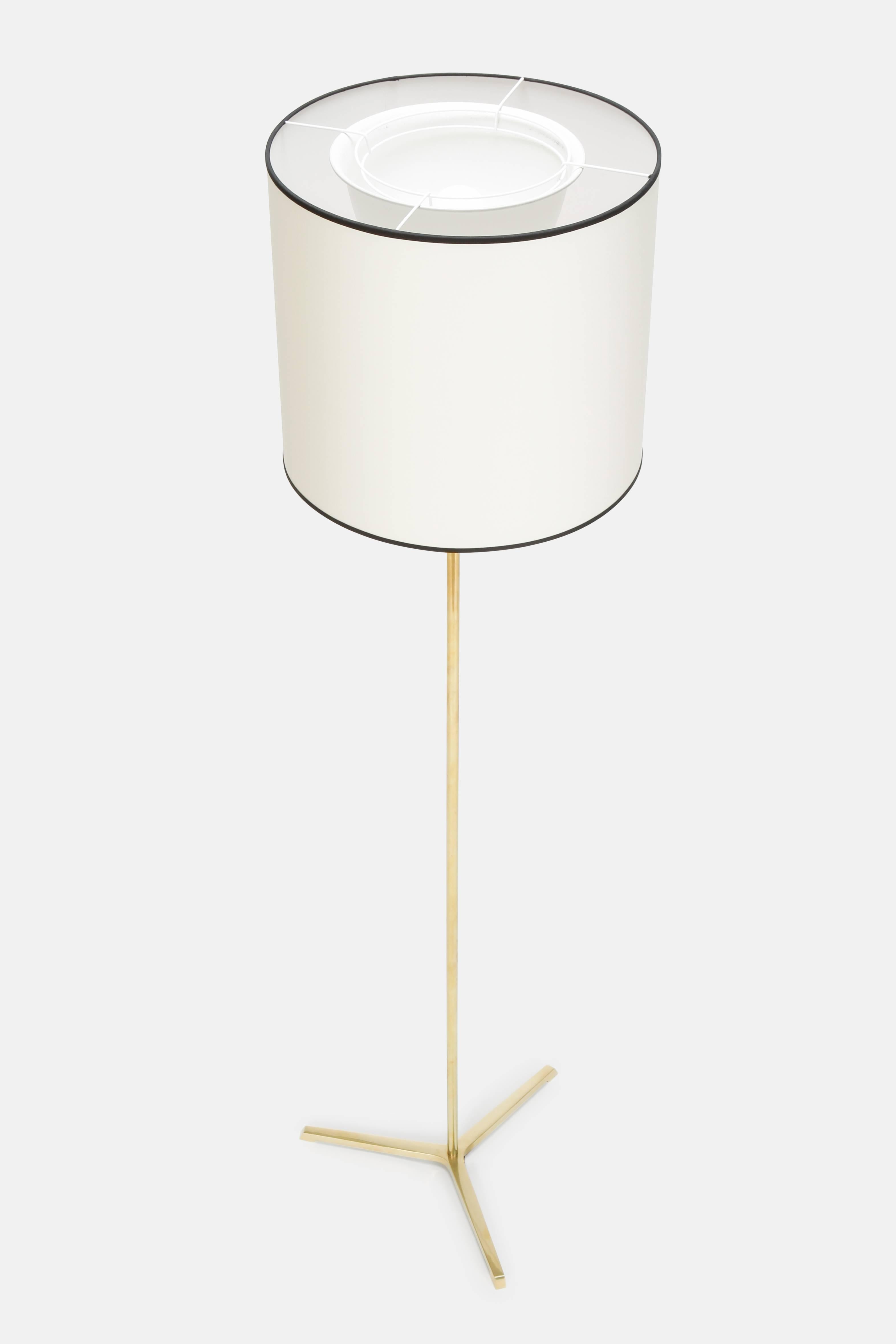 Swiss floor lamp designed and manufactured by Megal AG in the 1960s. Elegant, white cotton shade with black borders on a solid brass column. Completely new wired, very god condition. Beautiful proportions.