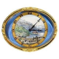 Horloge de bureau ovale suisse en laiton doré avec paysage suisse peint