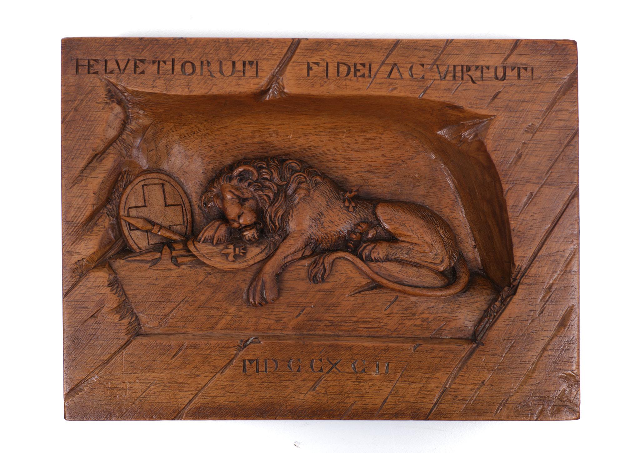 lion of lucerne wood carving