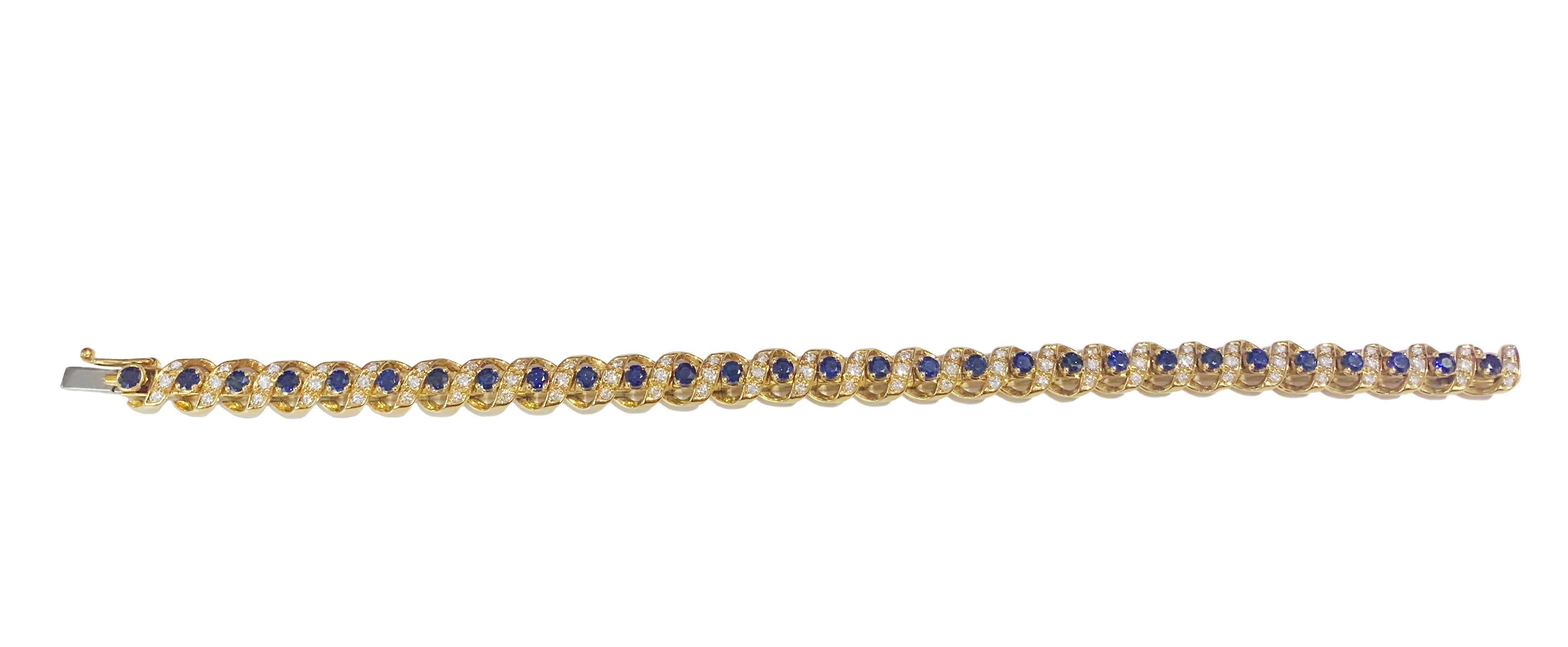 Mint condition
Swiss Made
18k yellow gold
2.9ctw of natural sapphire and approx. 1.2ctw of diamonds
Length: 7”
Width: 0.26”
Fully marked 