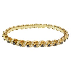 Bracciale Tennis Swiss Made in oro 18k con zaffiro e diamanti