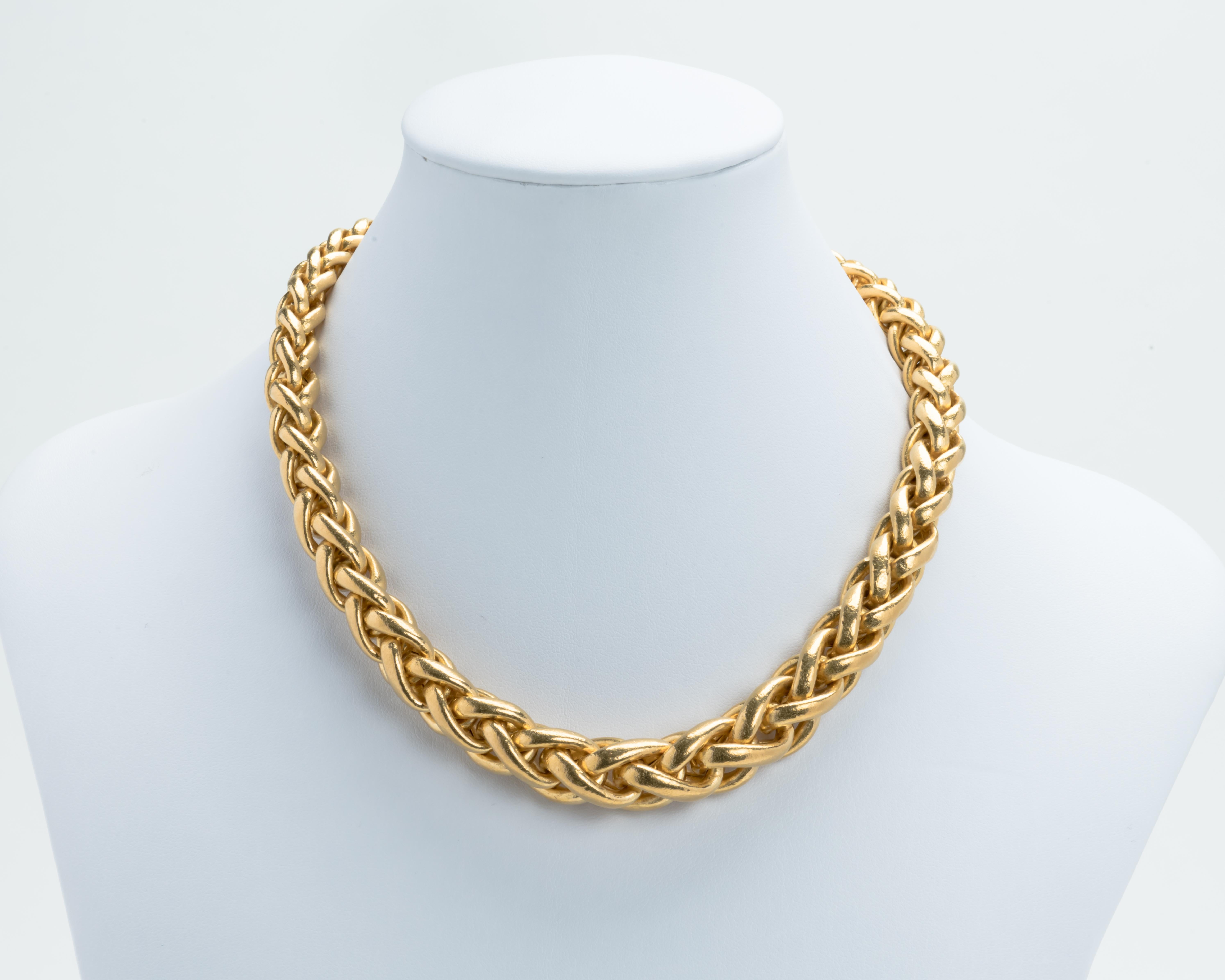 Matching Swiss 24 karat yellow gold, rope style necklace and bracelet. The necklace and bracelet were beautifully hand crafted in circa 1970. The gold color is reminiscent of pieces made 2000 years ago. The clasps are 18 karat gold to support the