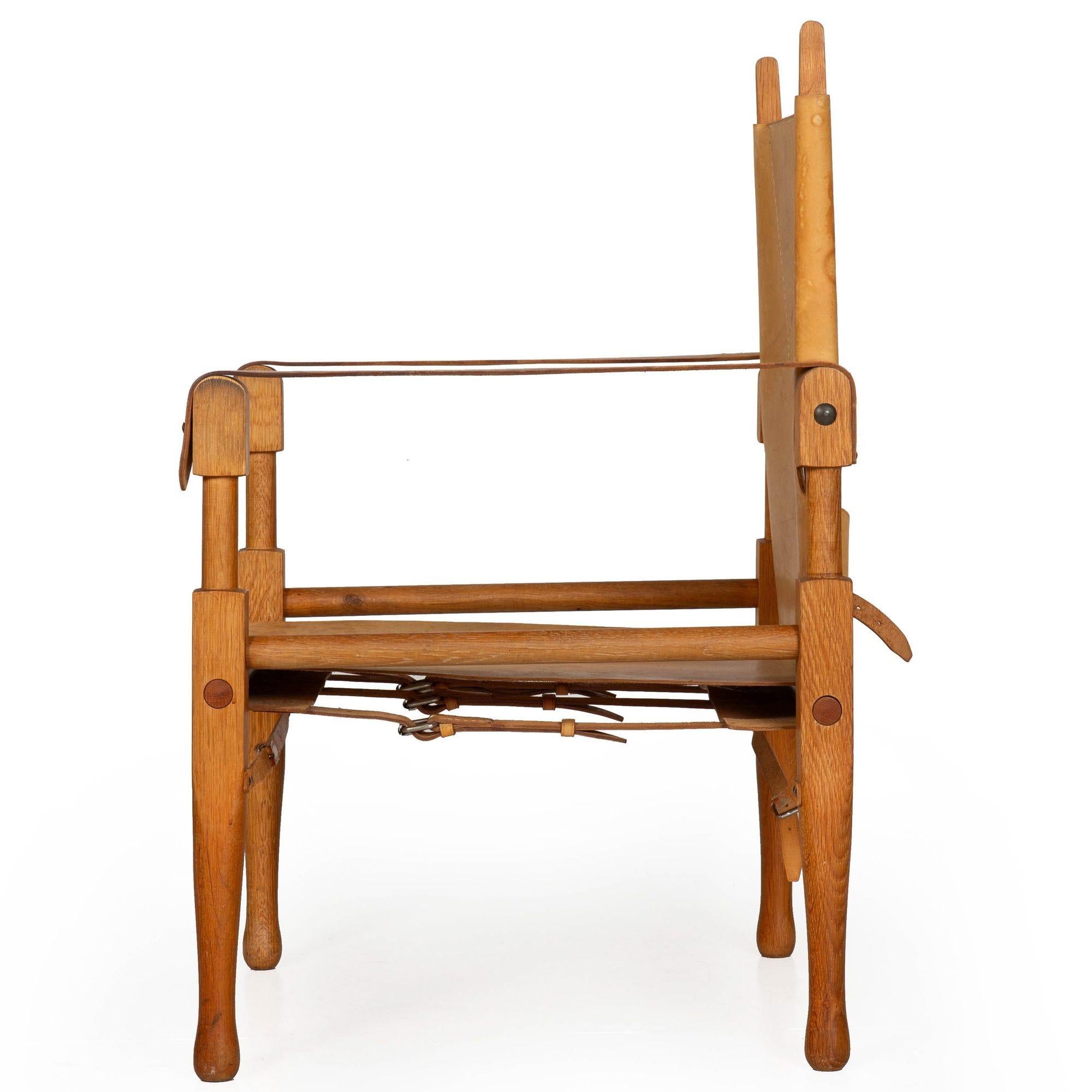Swiss Mid-Century Modern Leather and Oak Safari Chair by Wilhelm Kienzle In Good Condition For Sale In Shippensburg, PA