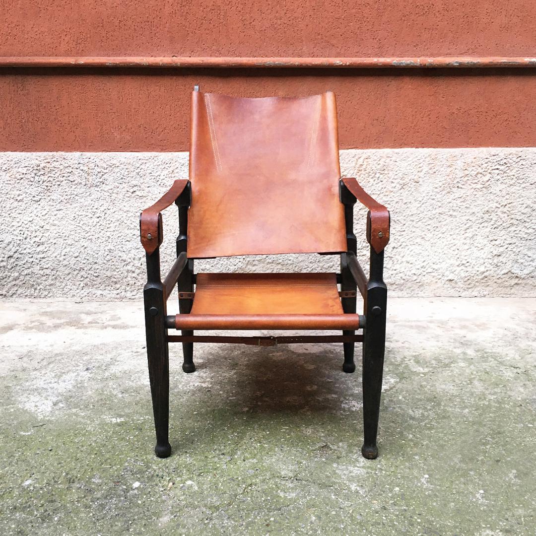 Swiss mid-century Safari chair by Wilhelm Kienzle for Wohnbedarf, 1930s
Safari chair with wooden structure, turned legs and armrests and with seat and back in cognac brown patinated leather. Designed by Wilhelm Kienzle in 1928 and manufactured by