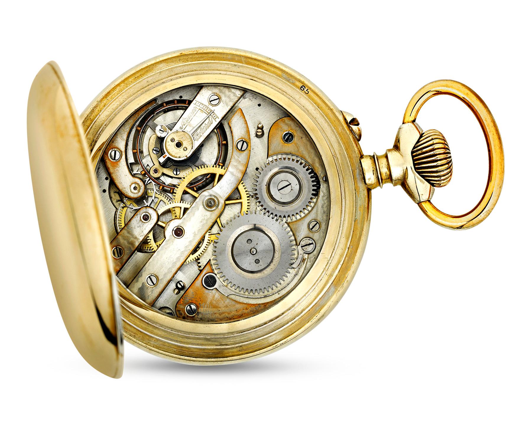 This classic Swiss pocket watch exhibits both stunning artistry and skilled workmanship. Roman numerals and an auxiliary seconds dial with a day/night indicator grace the clock face, along with dials that denote the day, month and date. Housed in a