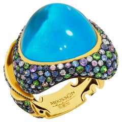 Bague en or jaune 18 carats, topaze suisse 25,86 carats, diamants, tsavorites et saphirs