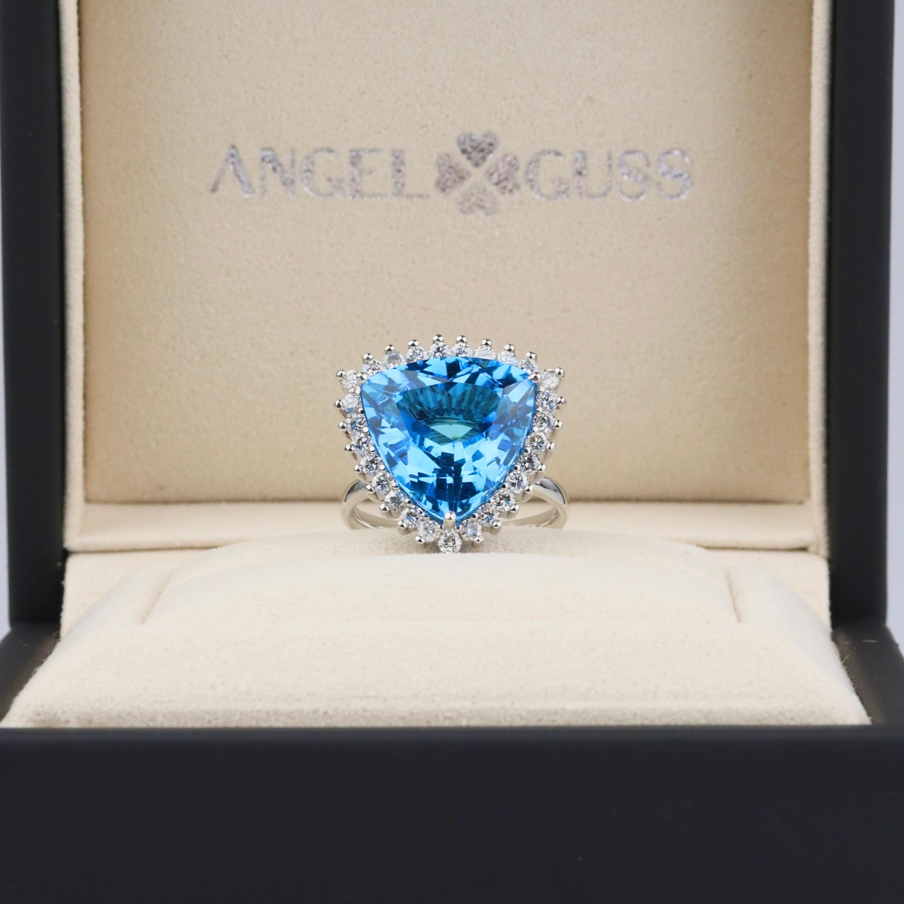 18K Solid White Gold

Natural Swiss Topaz Gemstone: Trillion shape, Size 12x12mm

Natural Diamonds: 21 diamonds, Round Cut, Size 2.00 mm

Ring Total Weight: 8g

The color gemstone is from Brazil

MEDIUM SIZE

Experience sophistication and elegance