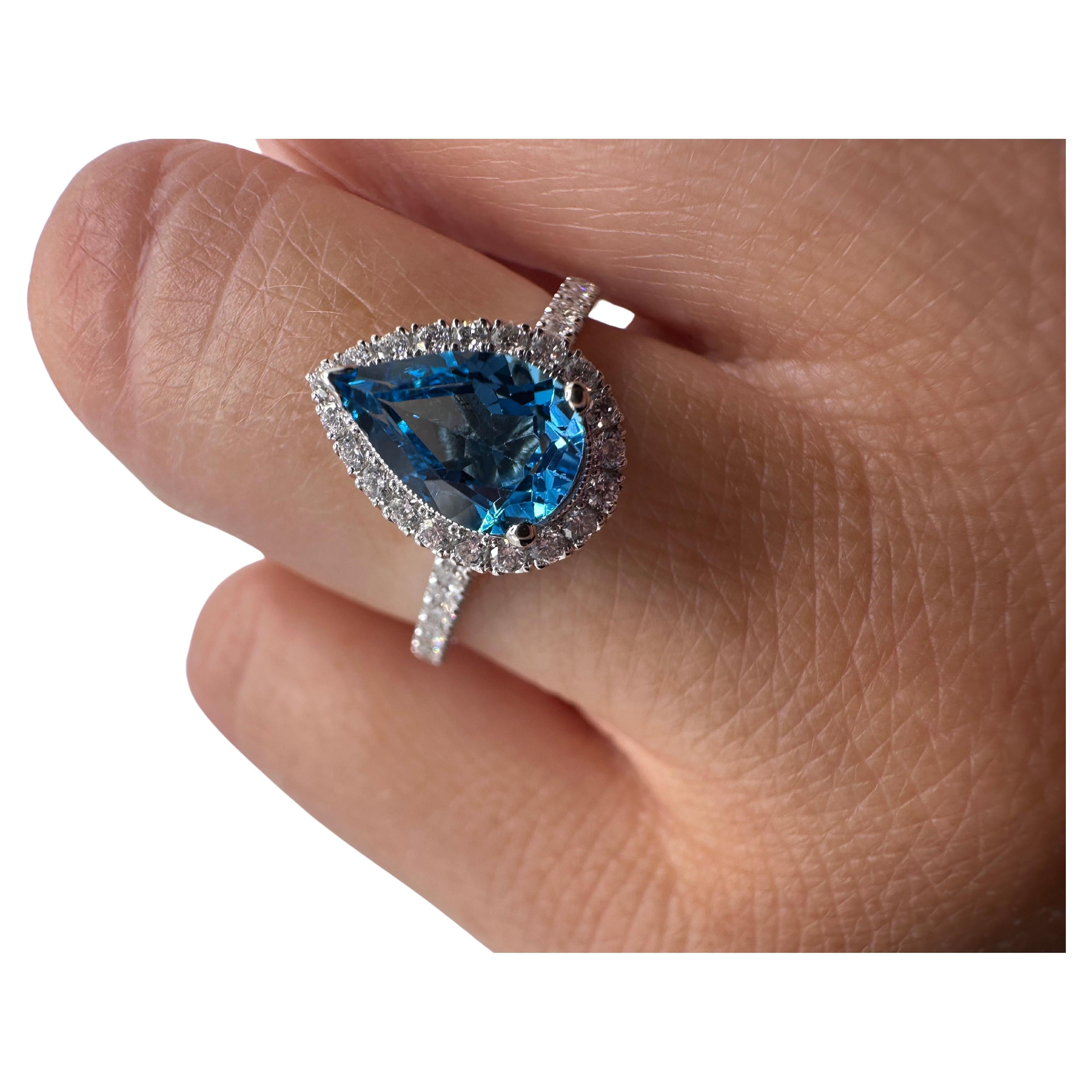Swiss Topaz & Diamond ring 18KT white gold