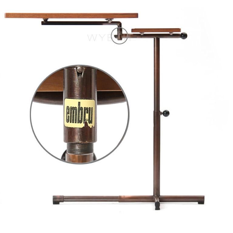 A beautifully engineered utility table workstation with a copper plated steel base. The upper surface swings around has a 90º tilt and adjusts to 26