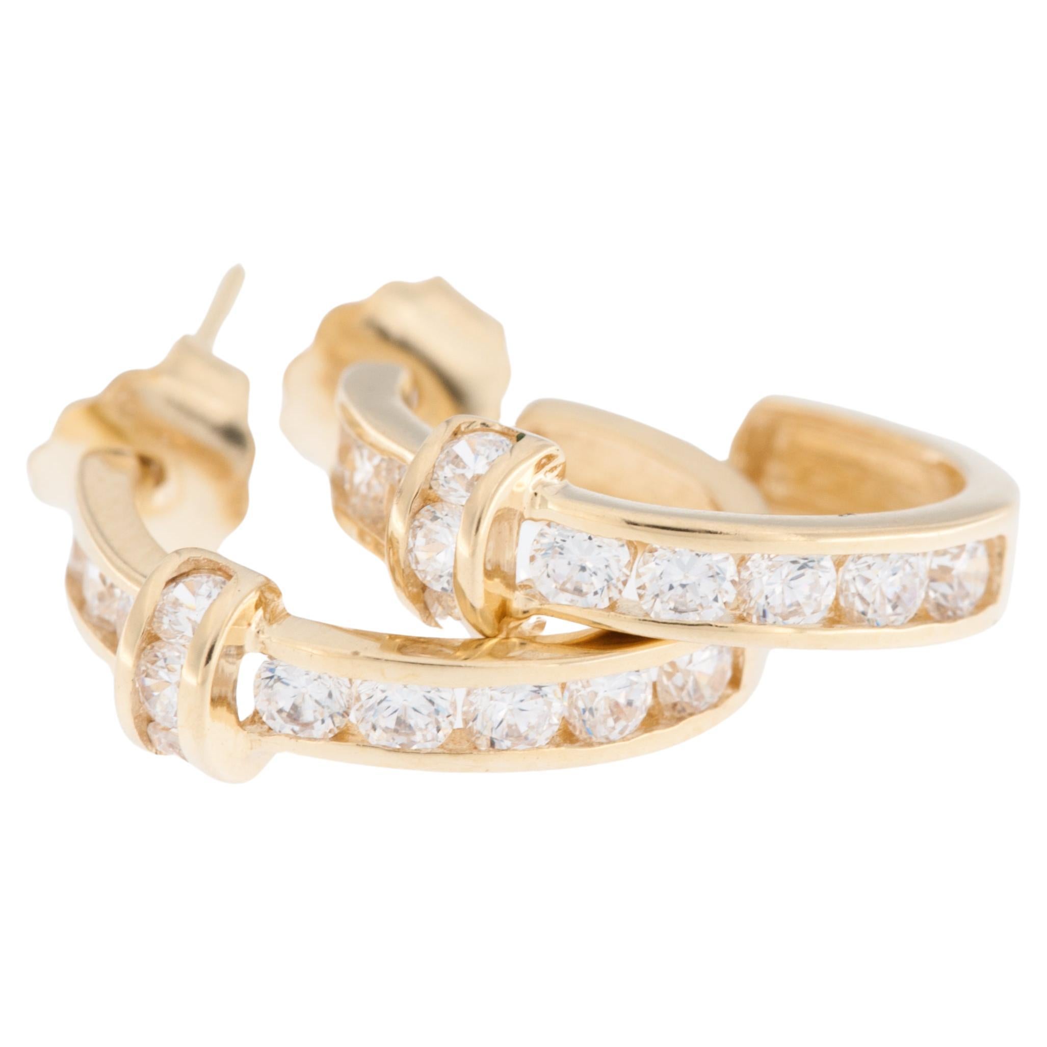 Boucles d'oreilles suisses vintage en or jaune 18 carats avec diamants