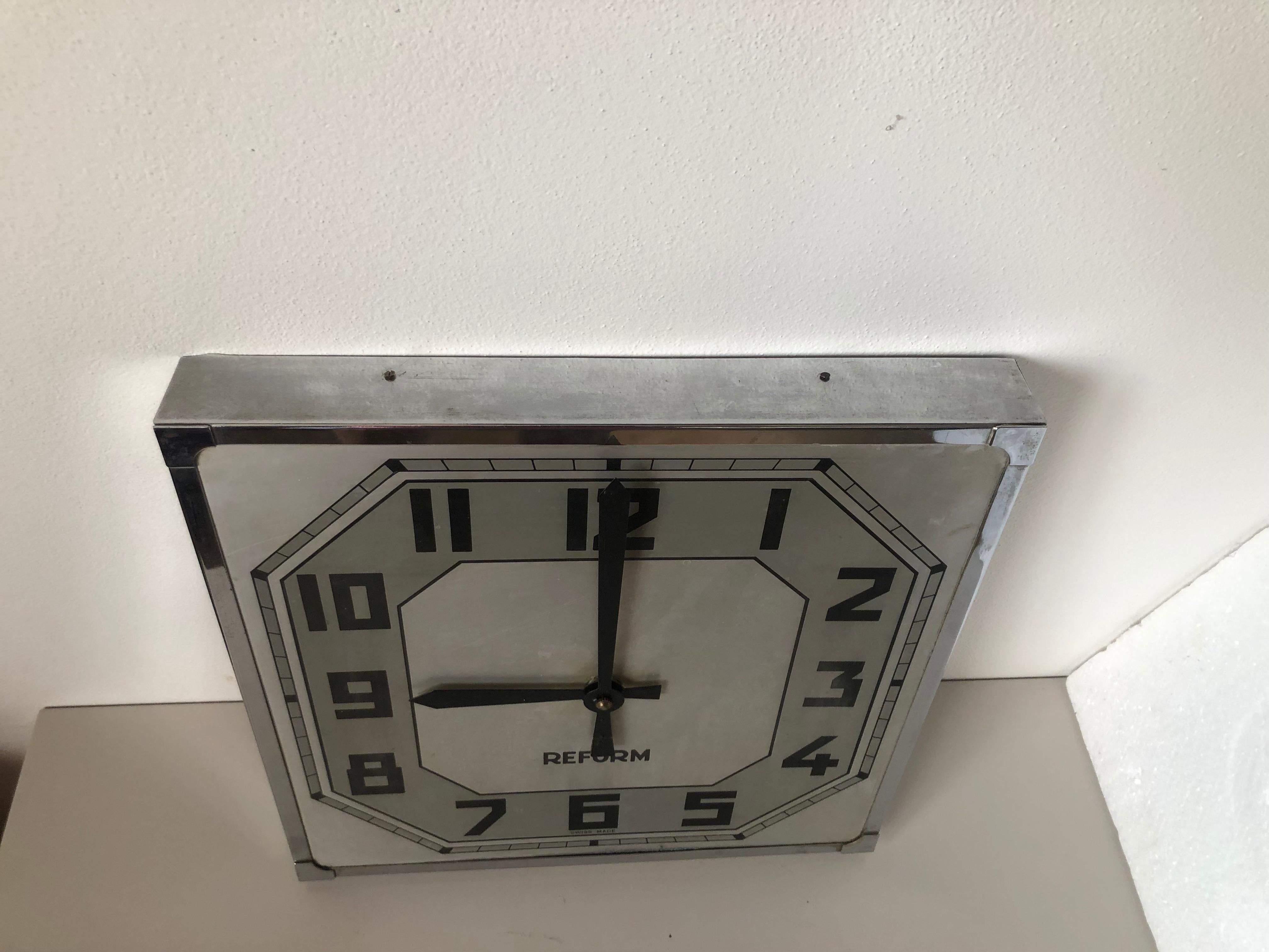 - Very unusual Industrial wall clock, from Switzerland
- the clock working on battery
- in good original condition
- Made from a chrome metal.

 