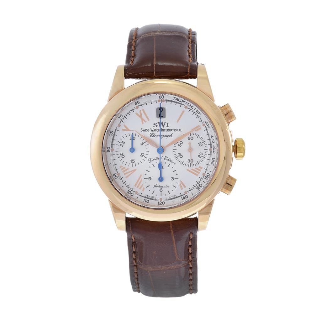 SWI Swiss Watch International 18KT Rose Gold Triple Chronograph Limited Edition Wrist Watch. Crafted with a 35mm 18KT rose gold case, this timepiece is a symbol of opulence and durability. Its white dial, adorned with rose gold Roman numerals and
