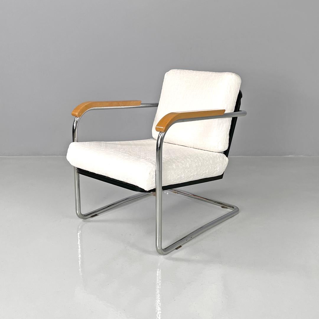 Swiss white fabric and metal armchair 1435 by Werner Max Moser for Embru, 2000s
Armchair mod. 1435 with a rectangular base. The seat and backrest are composed of two padded cushions covered in white fabric with a geometric texture, the structure is