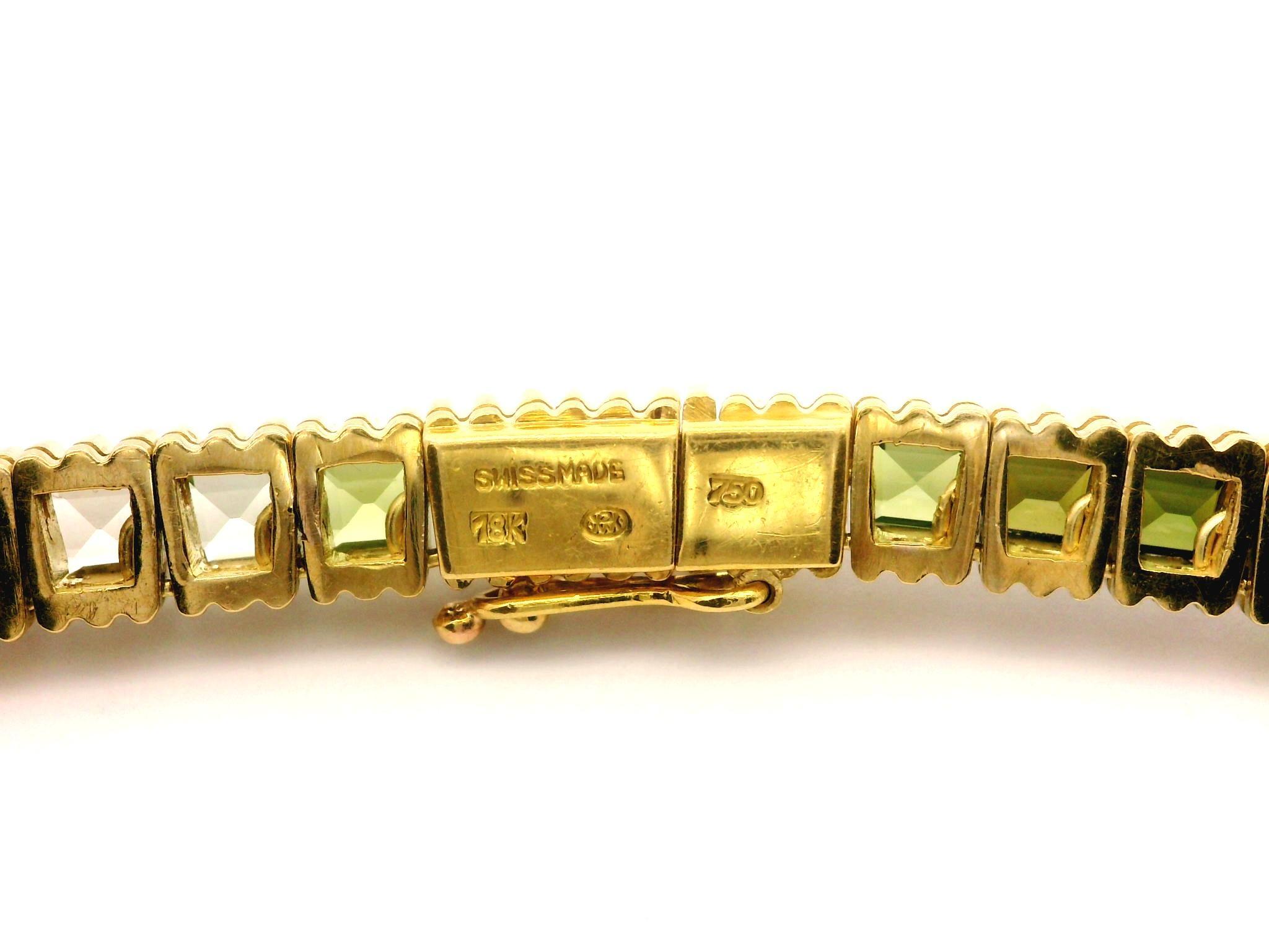 --Pietre: --
Numerose gemme naturali autentiche - tormaline, ametiste, granati, acquamarine, citrini, topazio e peridoti - taglio a gradini di calibro personalizzato - incastonatura a canale - colori rosa, viola, rosso, blu, arancione, giallo, verde