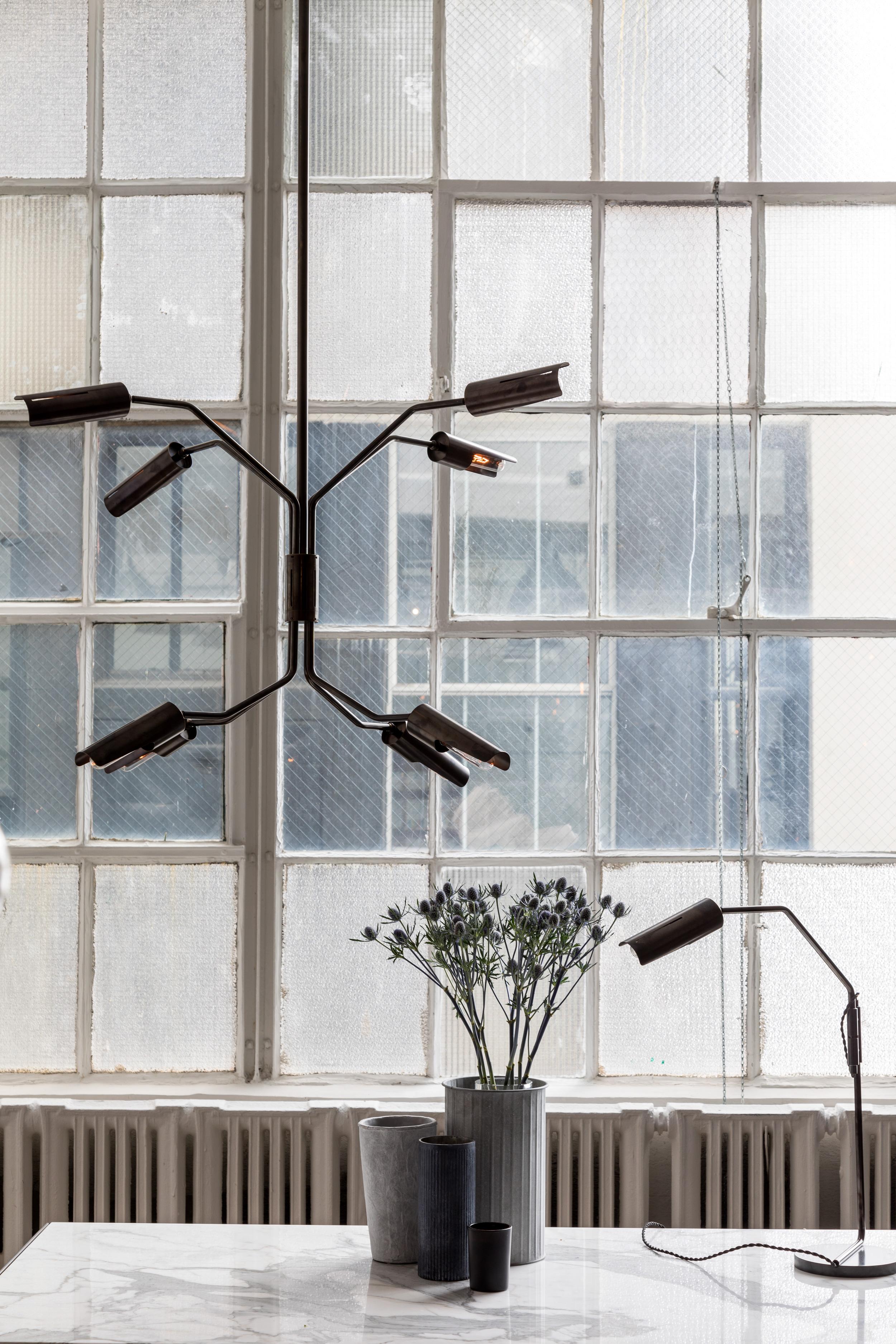 Made with hand-finished, finely cut brass, the design of the Switch collection emphasis the expression of material and the detailing of its components. The use of different finishes and patinas gives the fixture a retro Industrial Design that is
