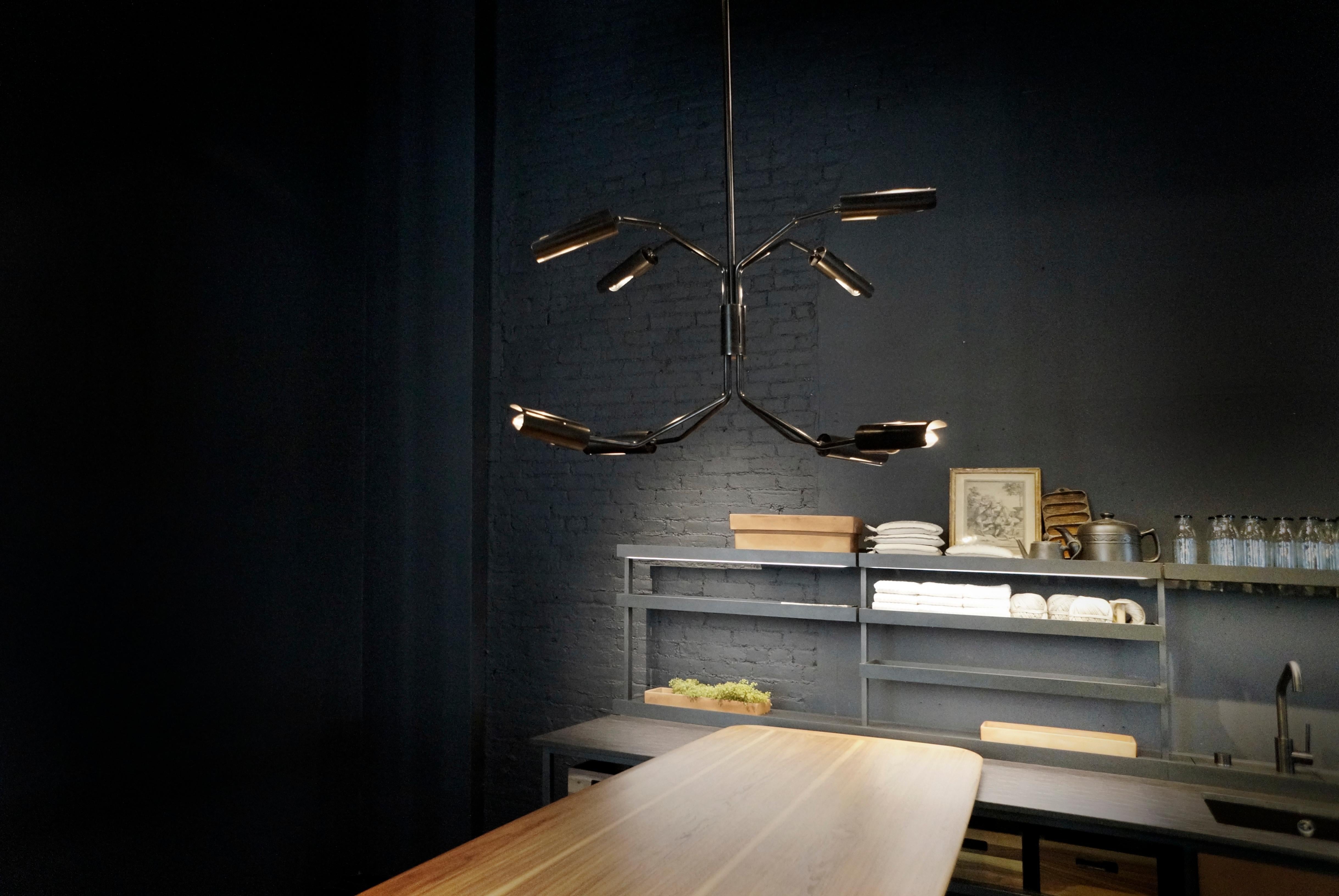 Switch 8-Arm Chandelier - dark patinated brass In Excellent Condition For Sale In NEW YORK, NY