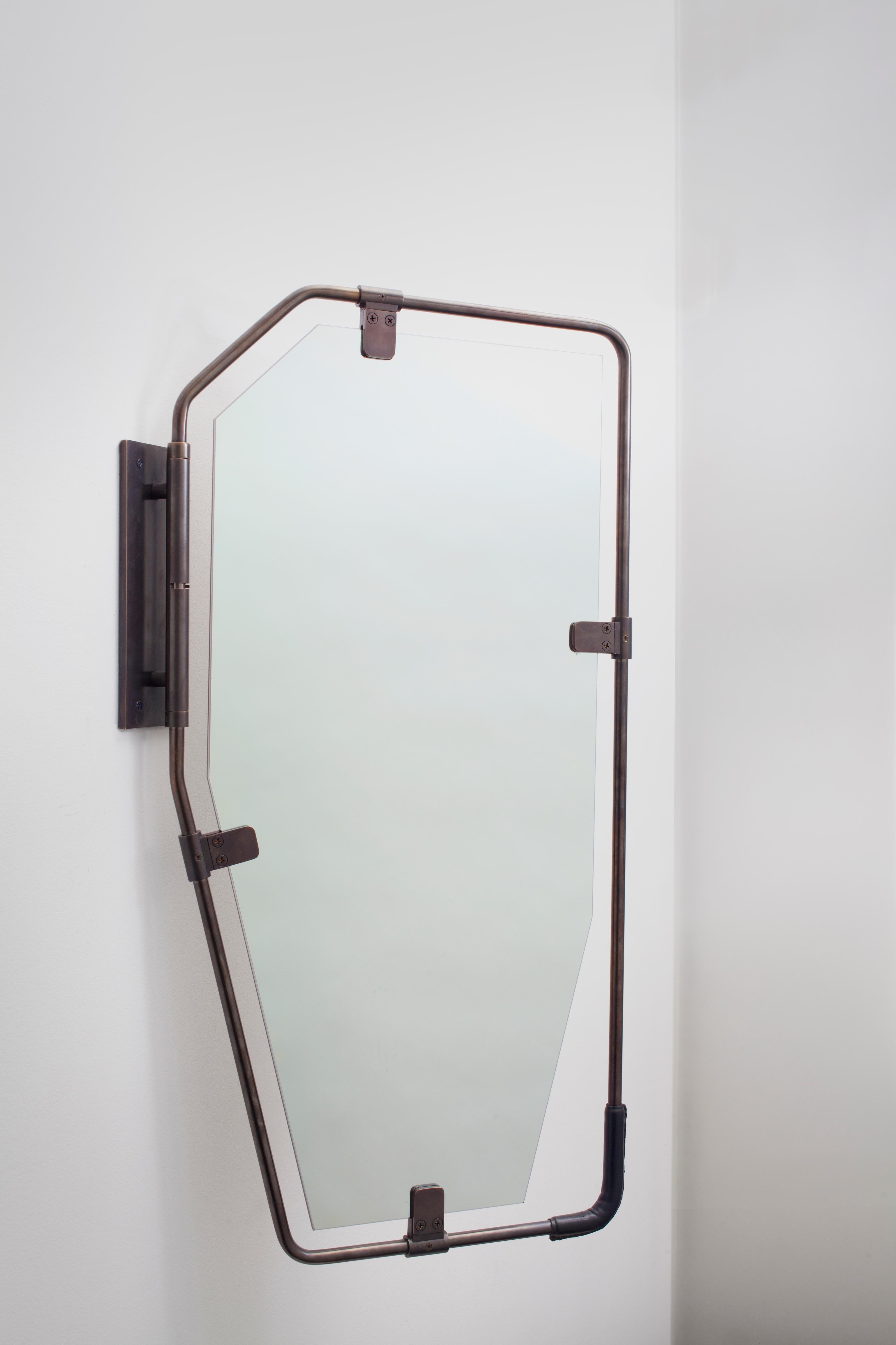 Following the same industrial design language of the Switch Lighting Collection, the Switch Mirror was conceived as a “subtle & social” mirror that can be used in different residential or commercial spaces. 

Utilizing the brass frame and fittings,